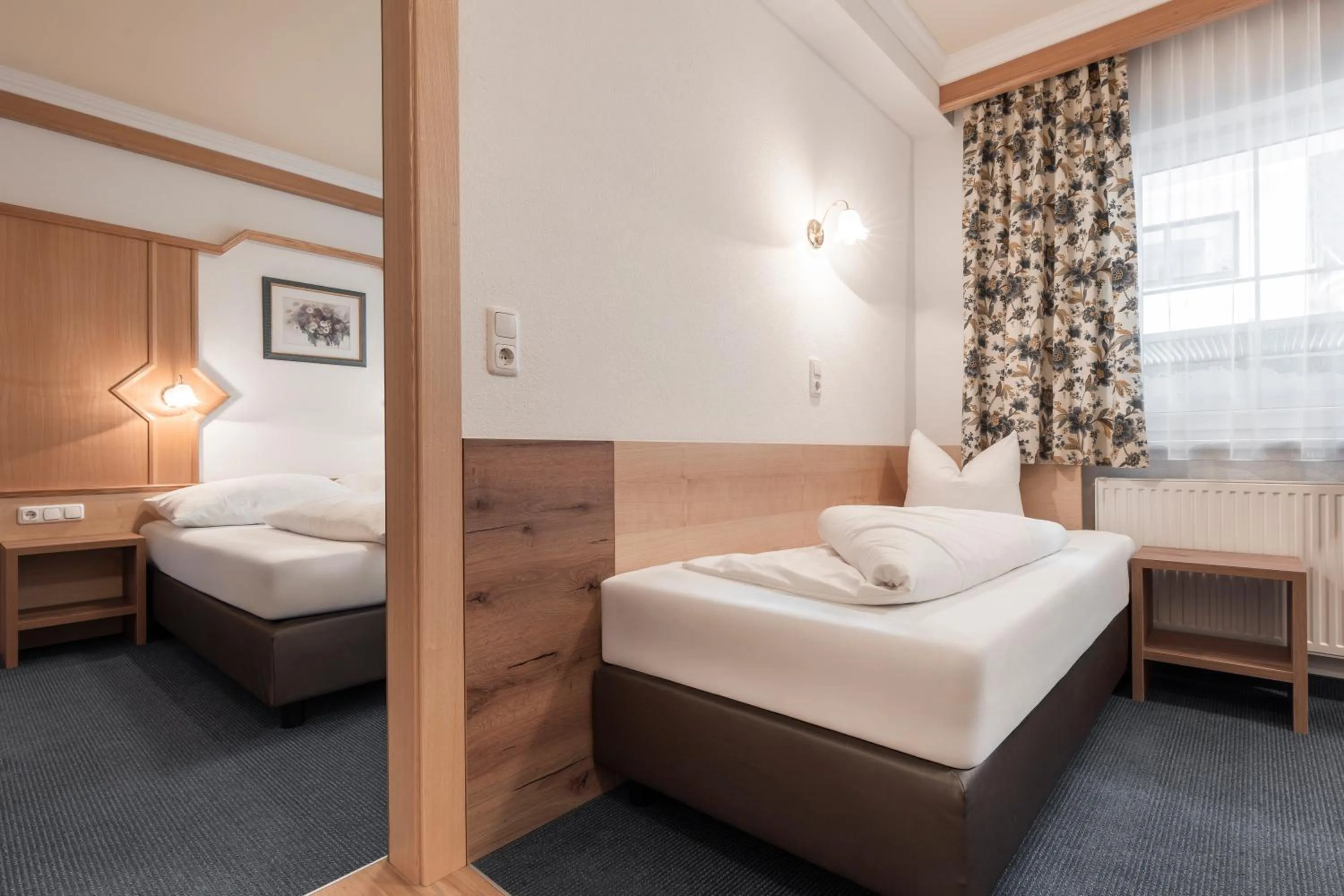 Bed in SCHMID Rooms & Apartments