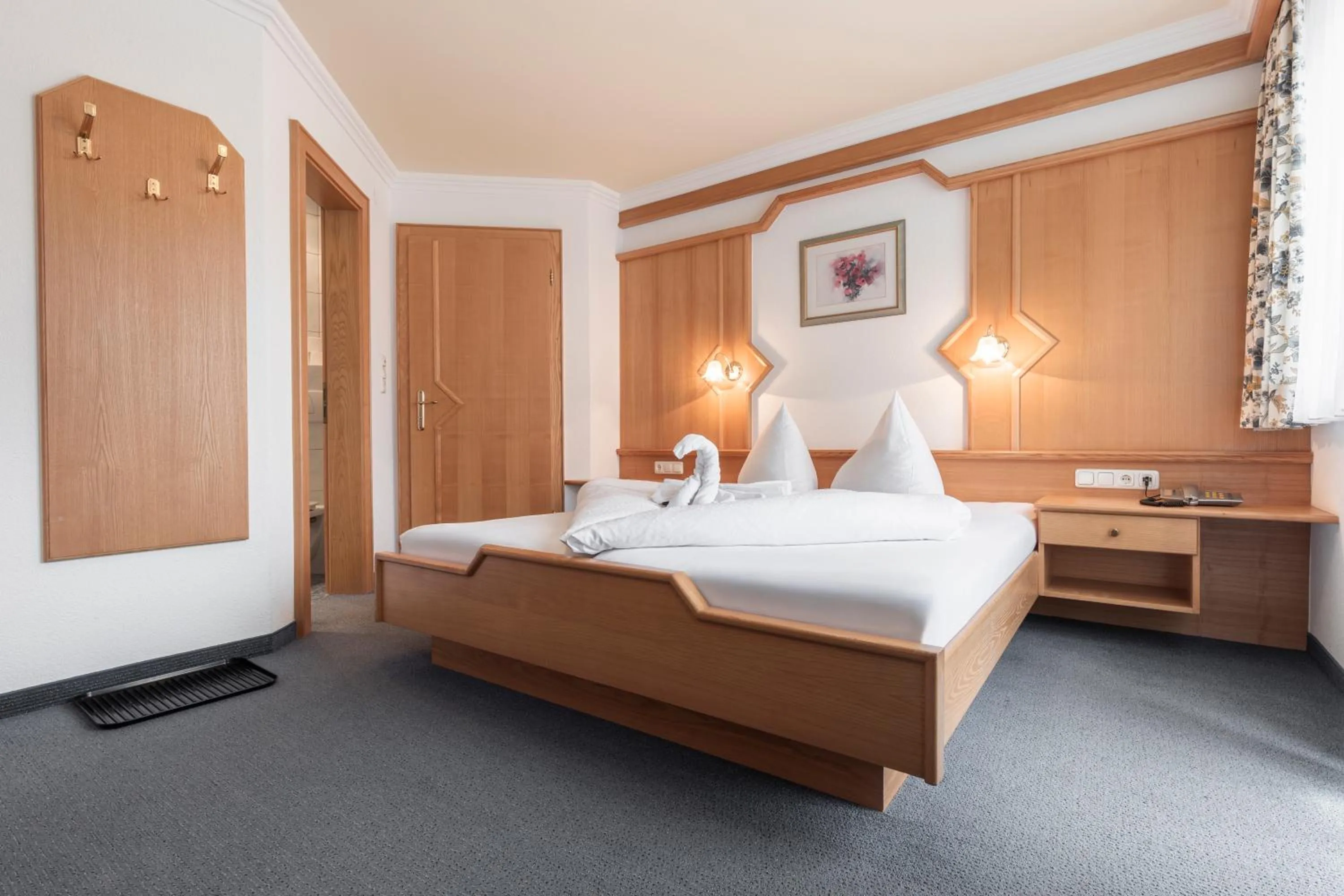 Bed in SCHMID Rooms & Apartments