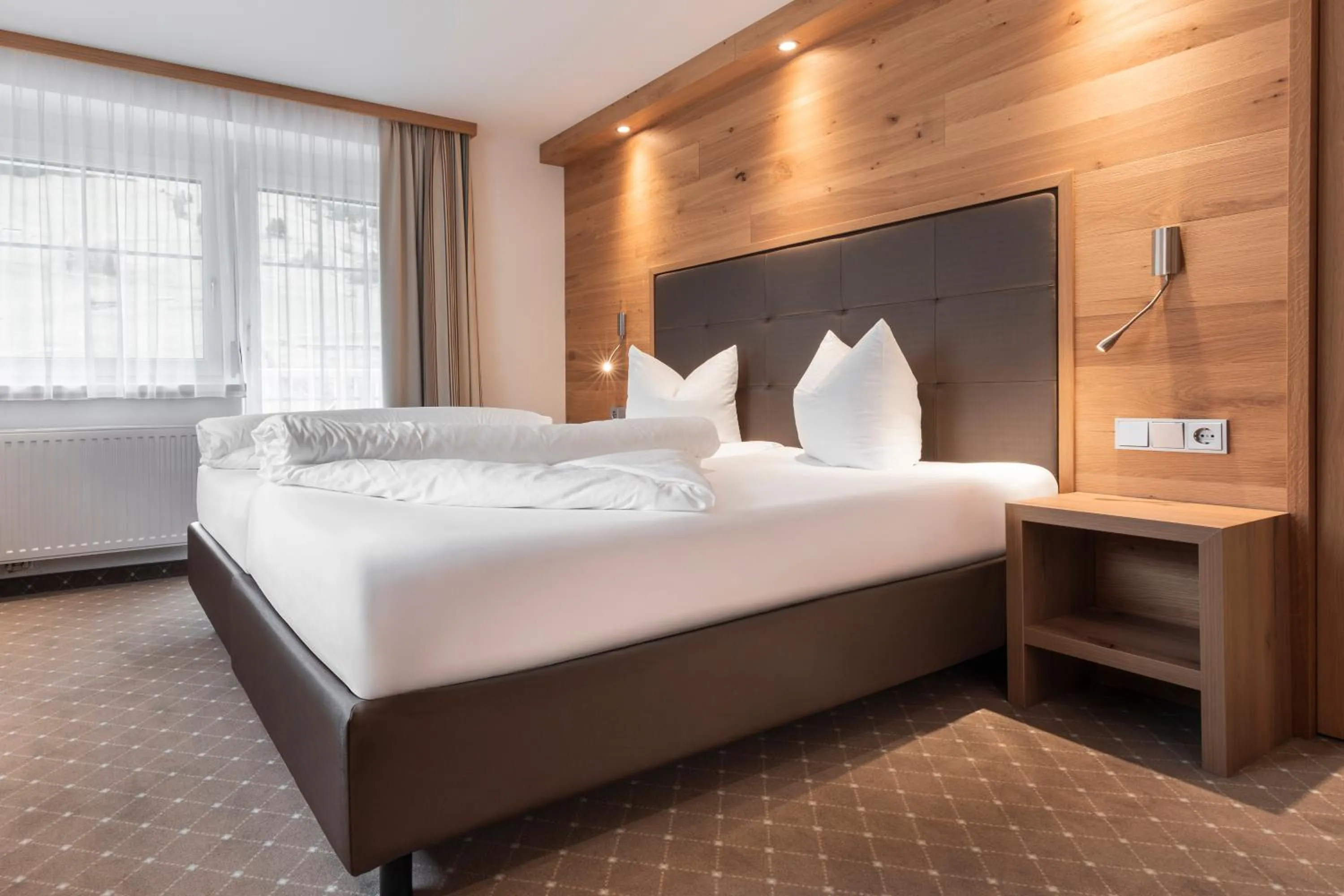 Bed in SCHMID Rooms & Apartments