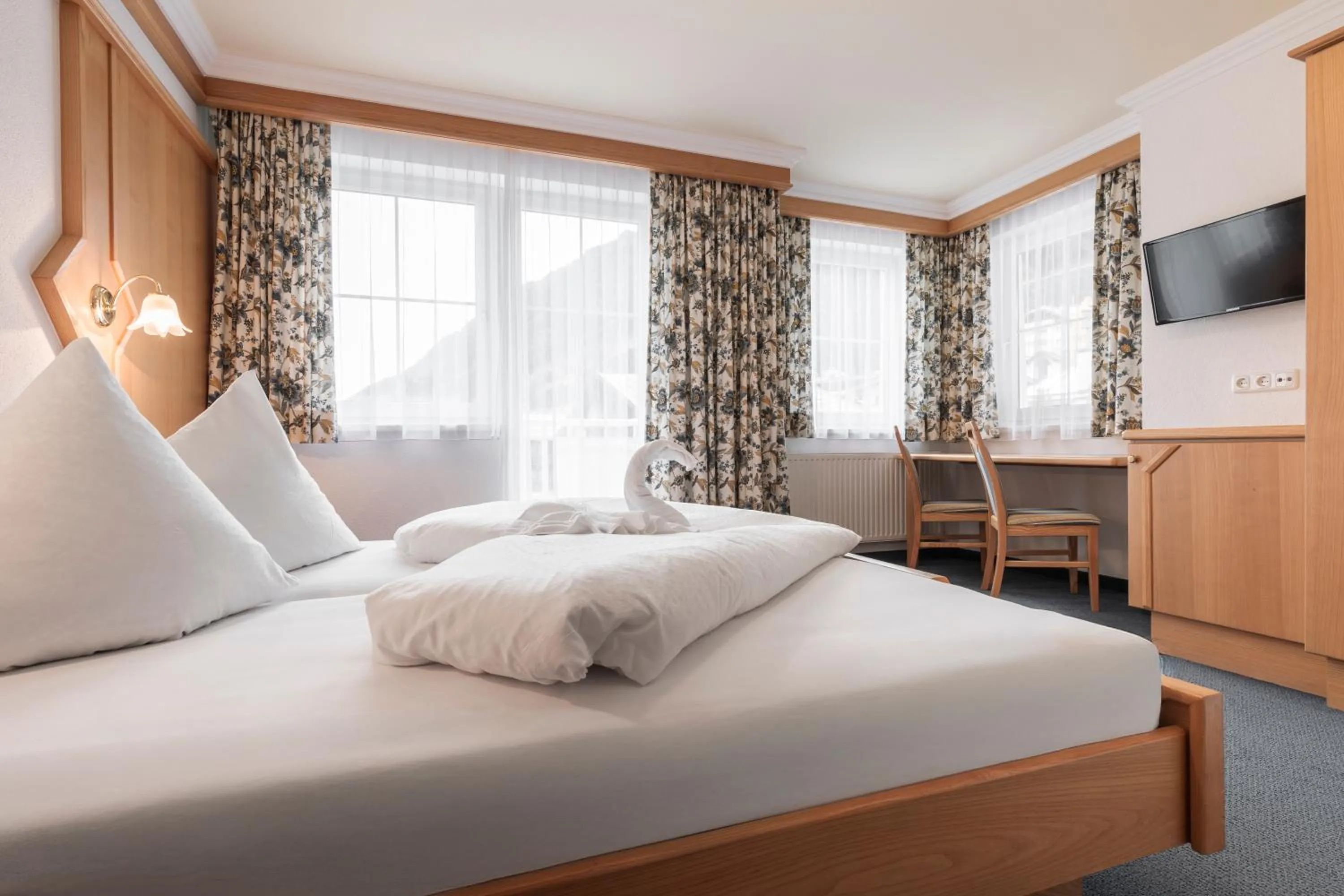 Bed in SCHMID Rooms & Apartments