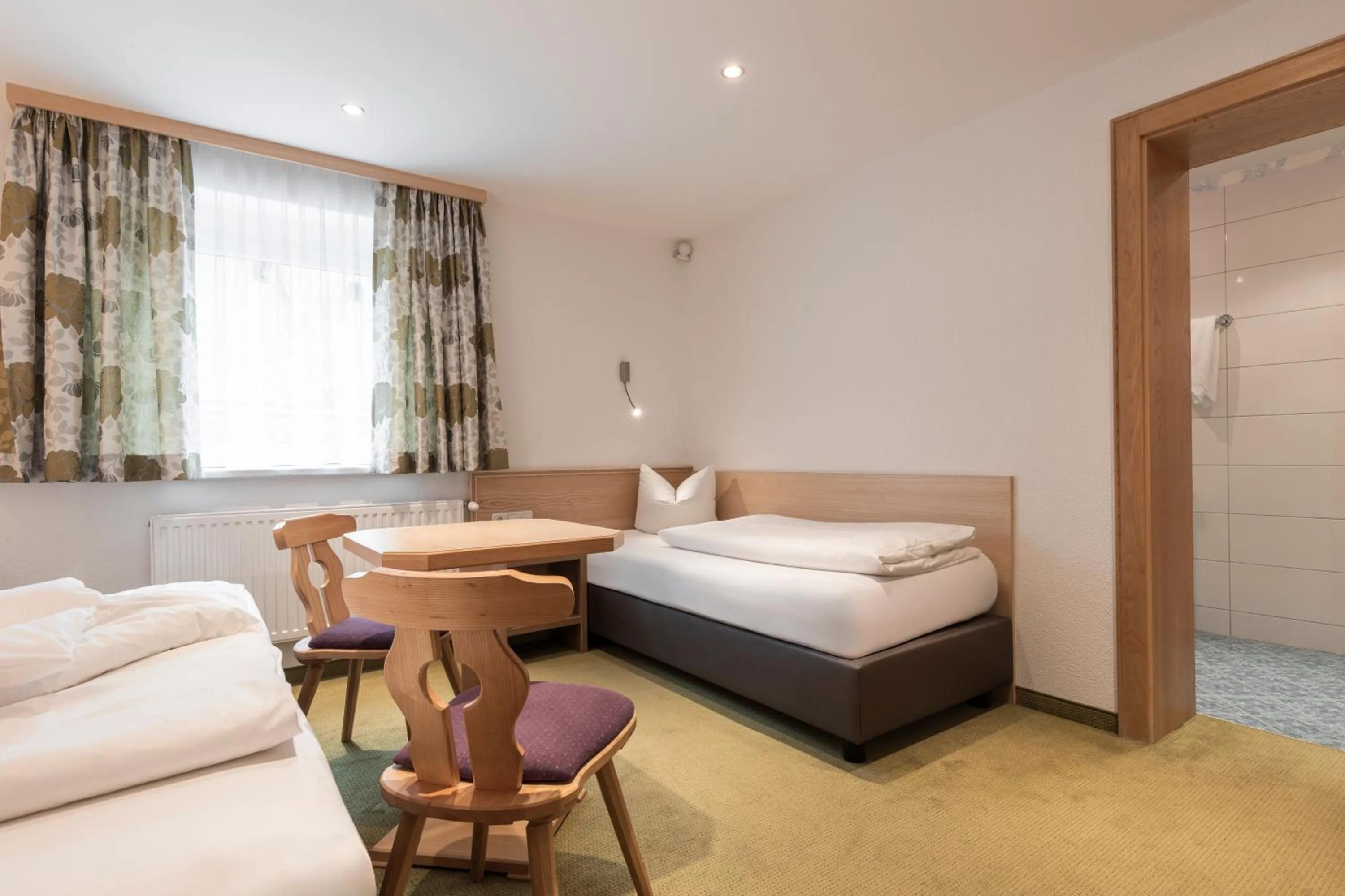 Bed in SCHMID Rooms & Apartments