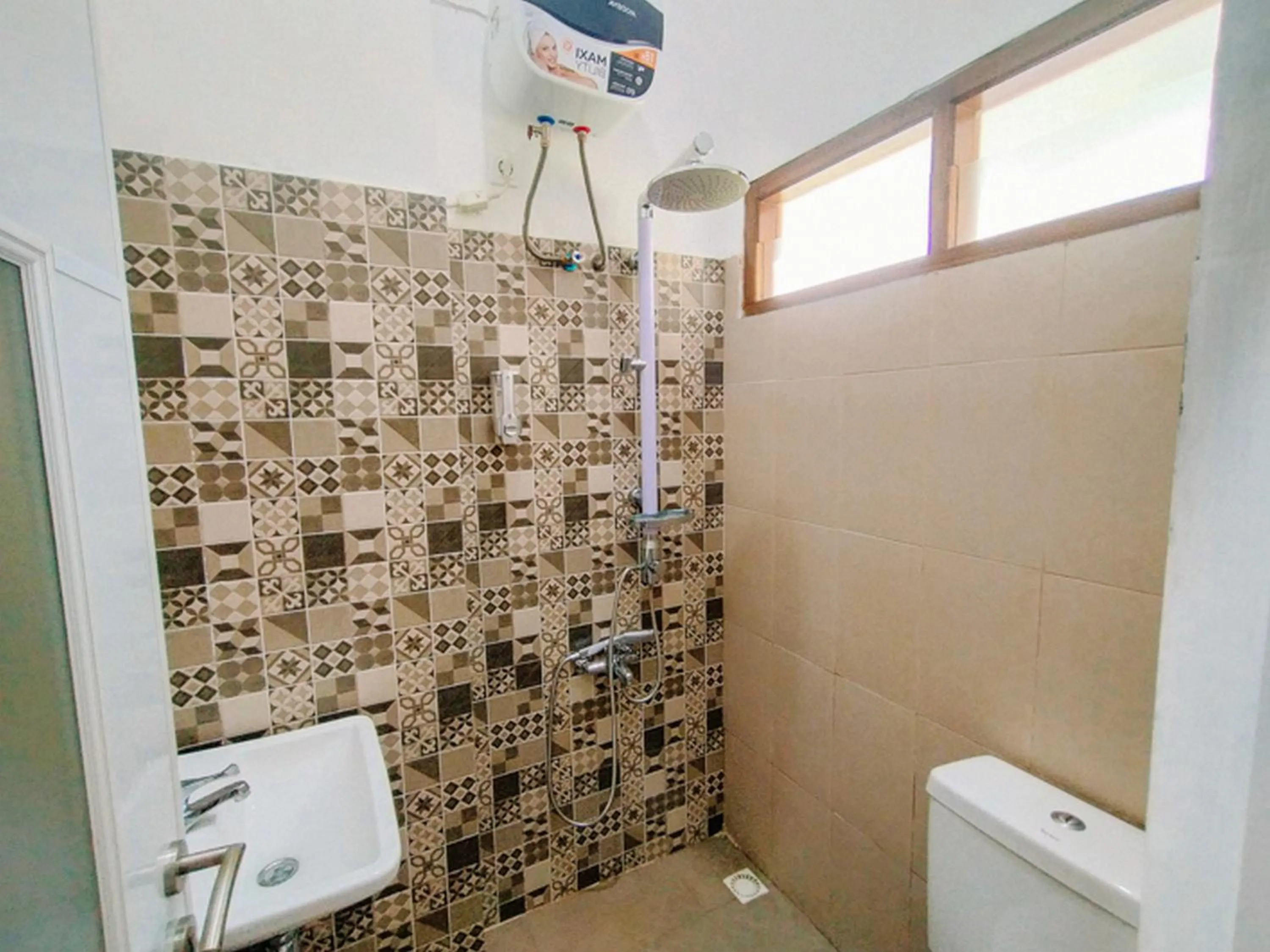 Property building in RedDoorz At Artomoro Guest House