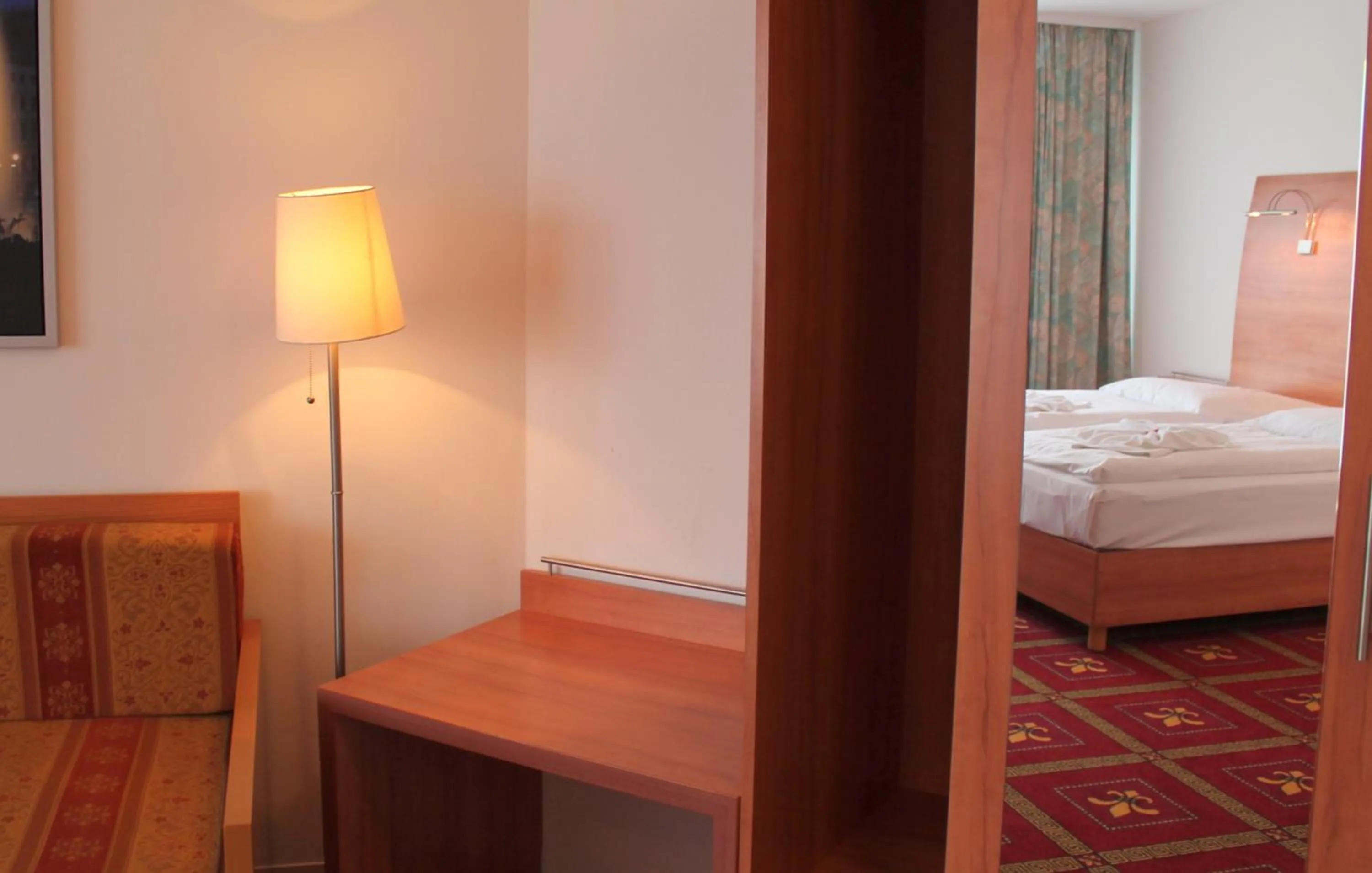 Seating area, Bed in Hotel Kaiser