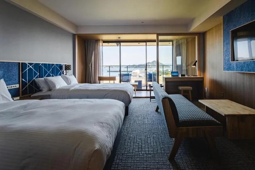 Photo of the whole room, Bed in UNO HOTEL