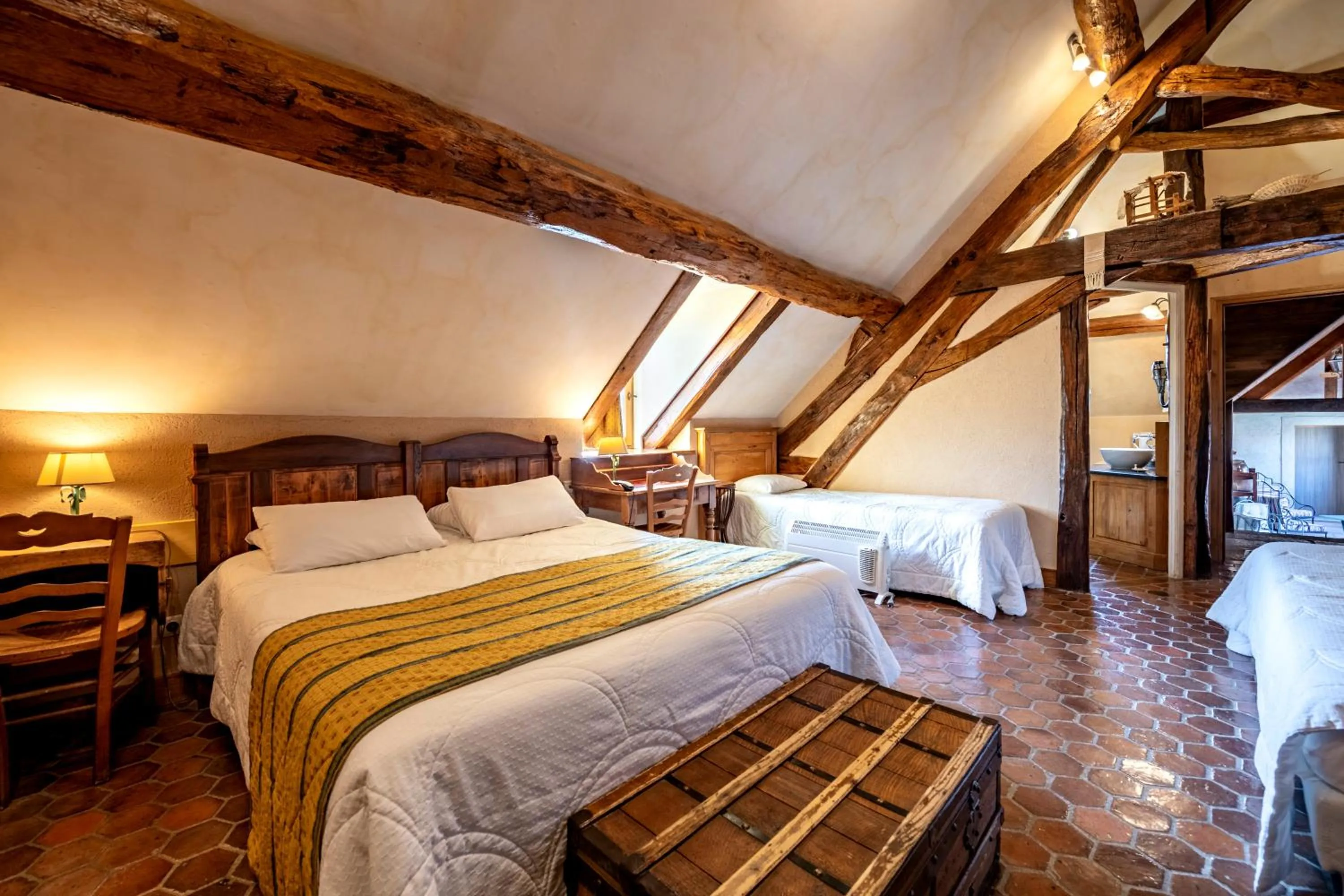 Bed in Hôtel De La Beursaudiere