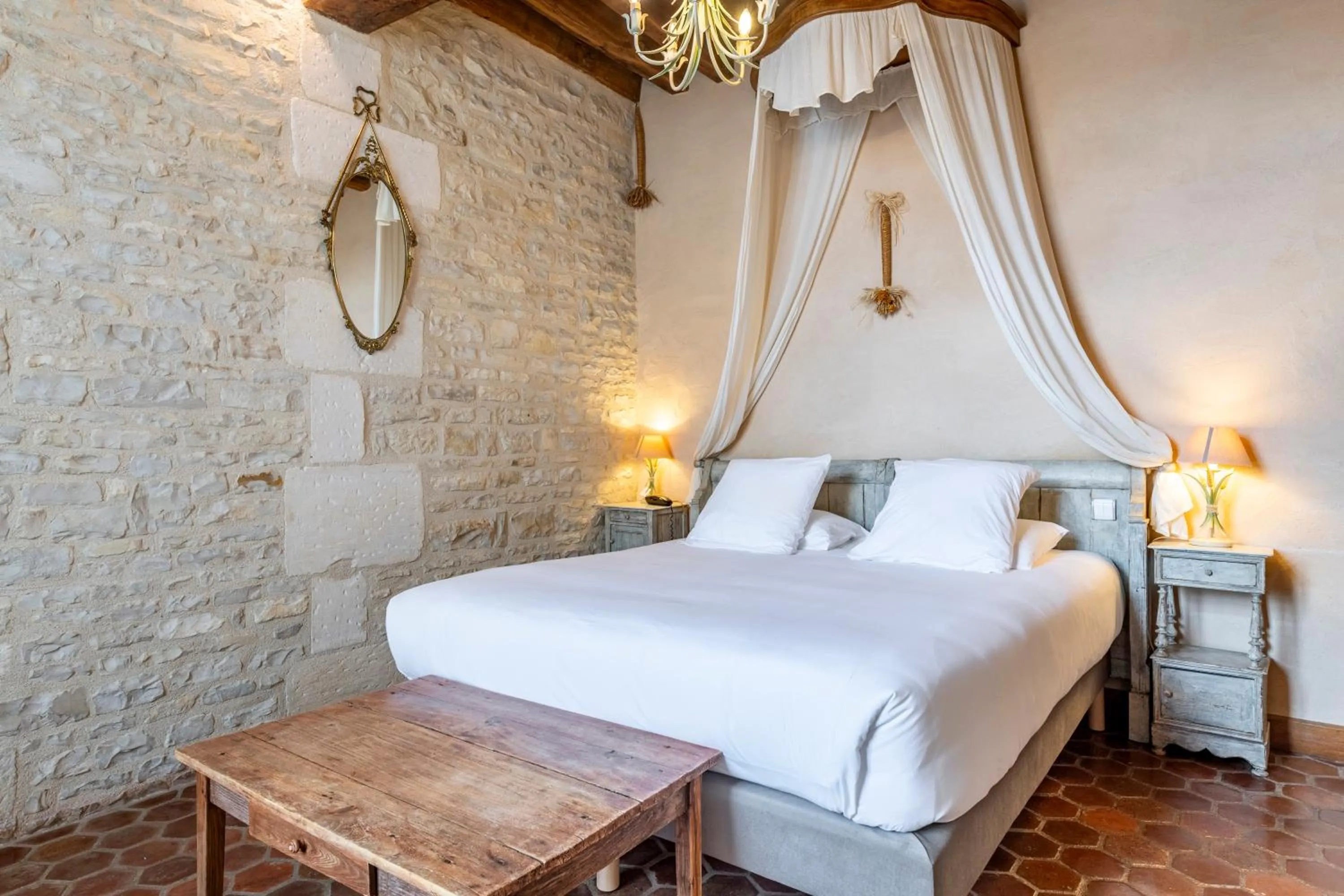 Bed in Hôtel De La Beursaudiere