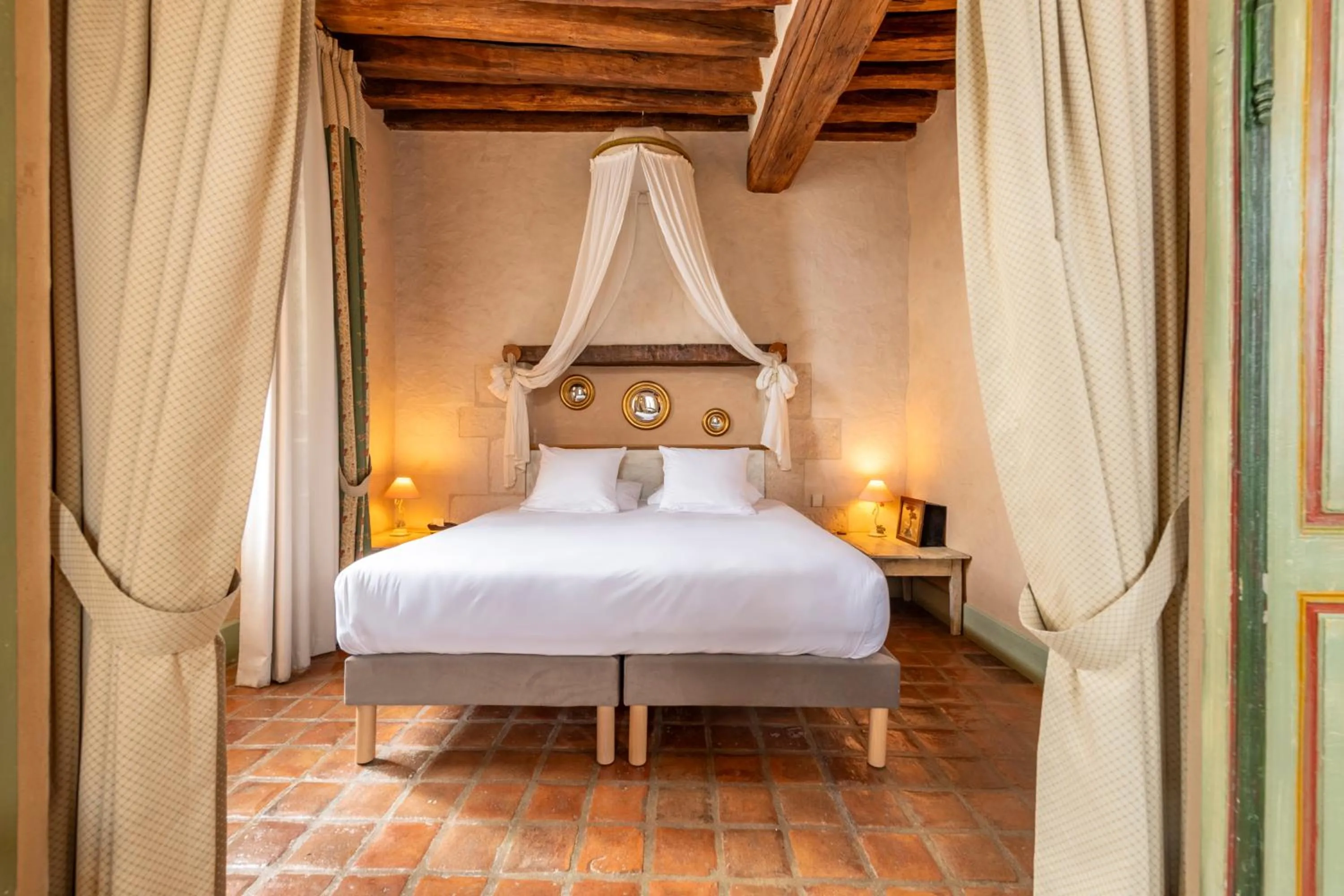 Bed in Hôtel De La Beursaudiere