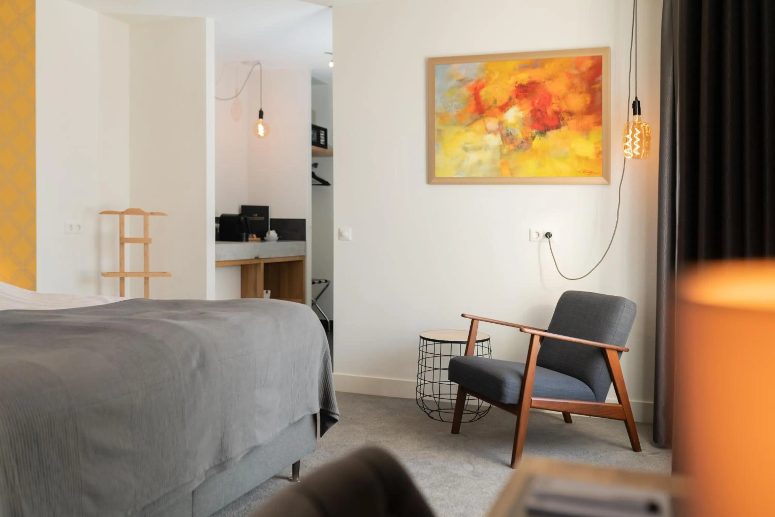 Seating area, Bed in Boutique hotel & brasserie de Heerlyckheid