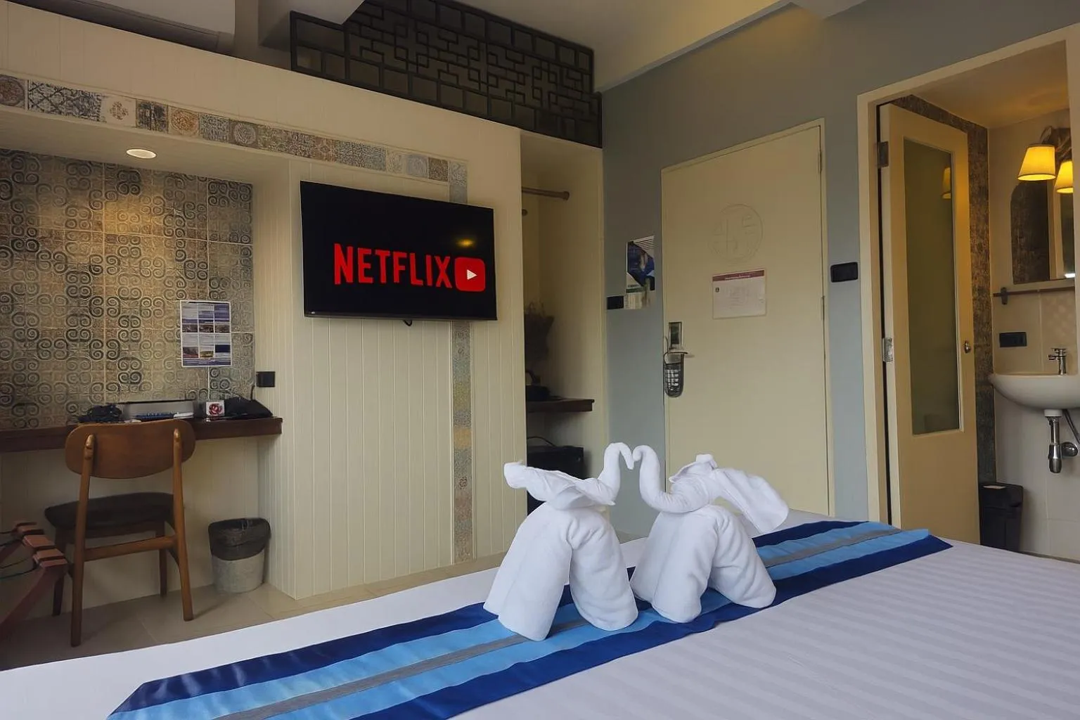 Bed in Montree Phuket Hotel