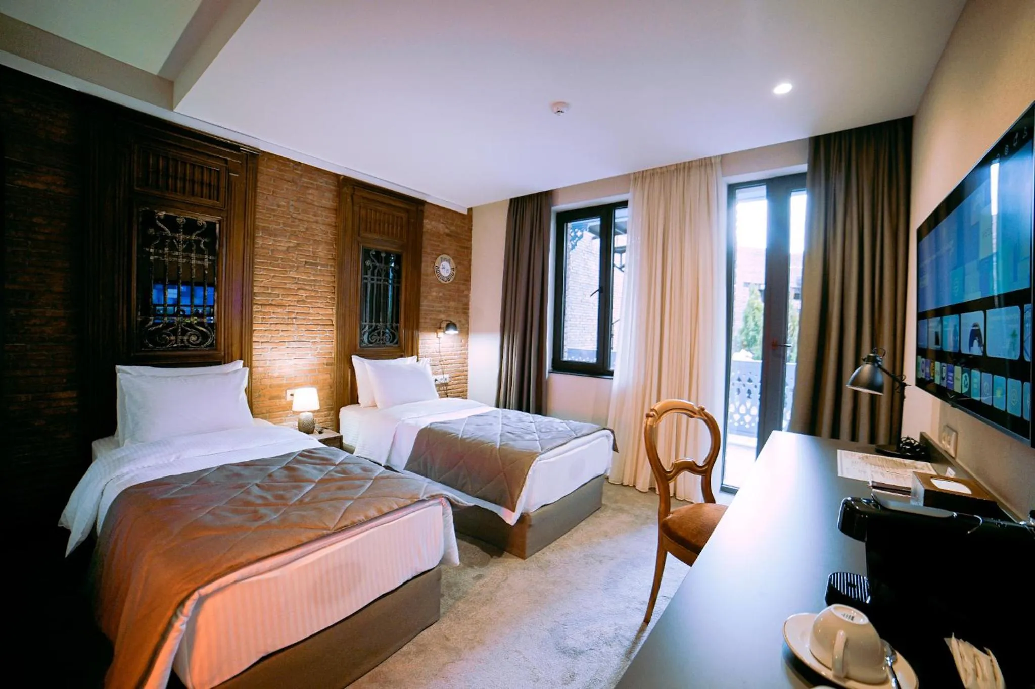 Bed in TbiliSee Hotel