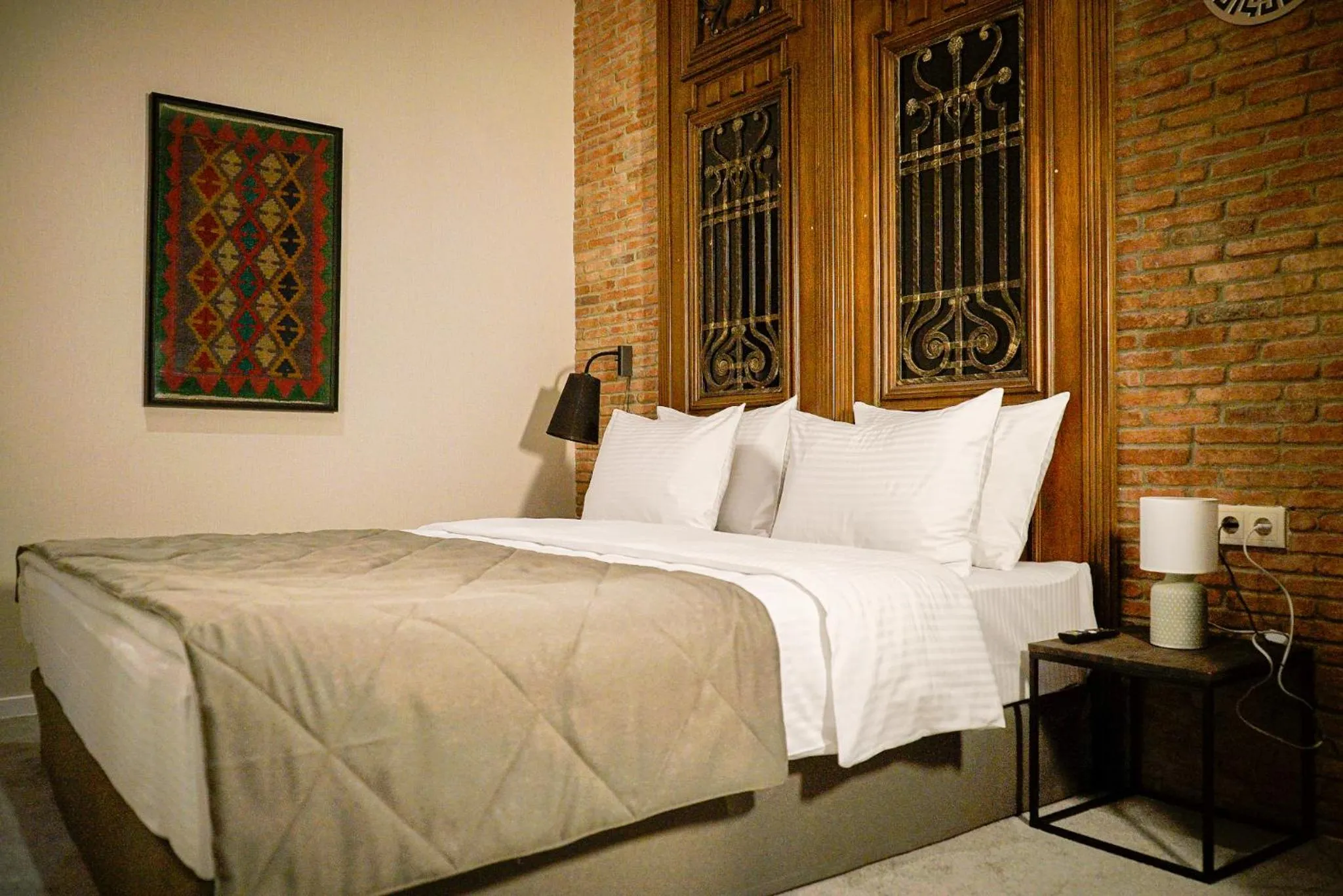 Bed in TbiliSee Hotel