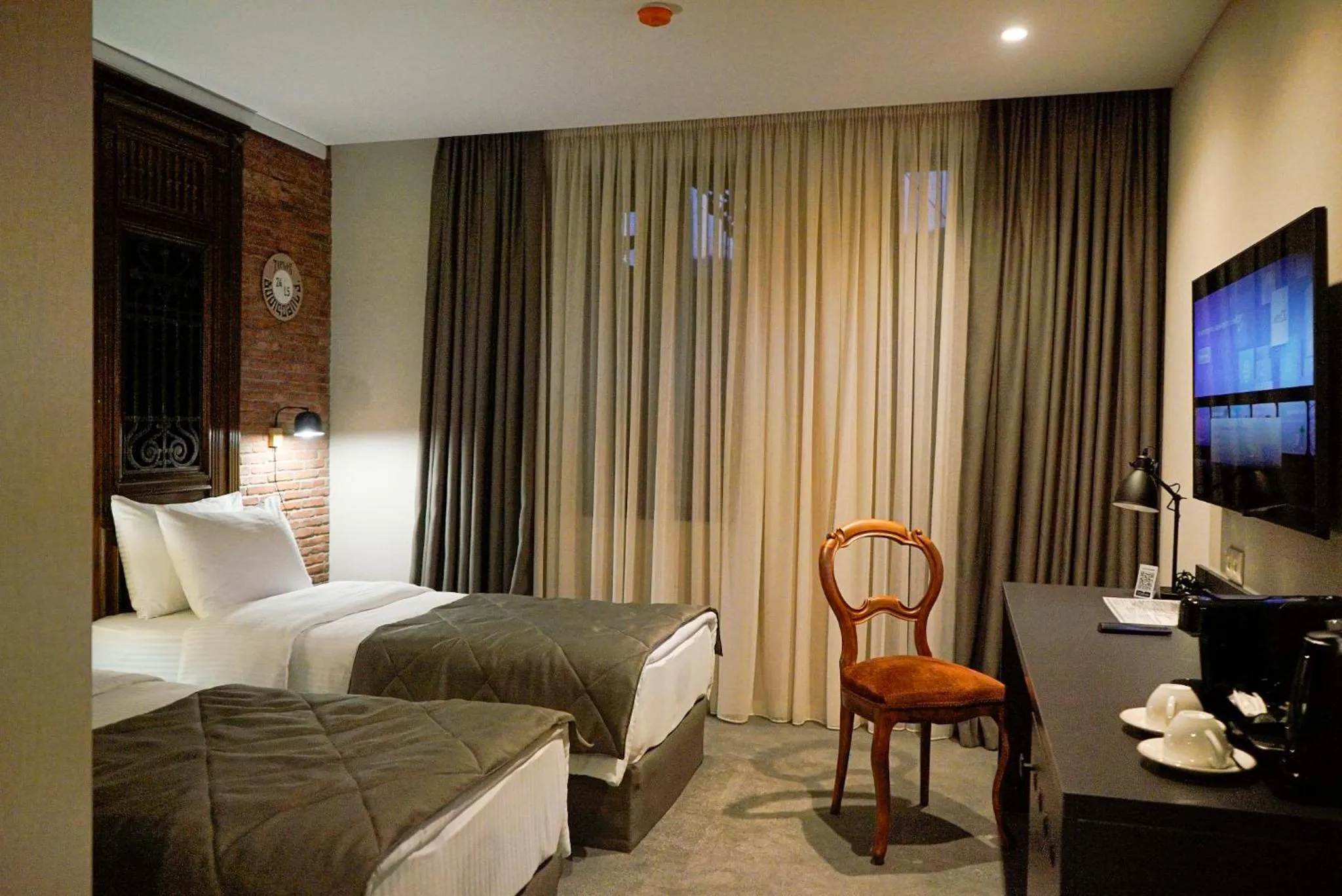 Bed in TbiliSee Hotel