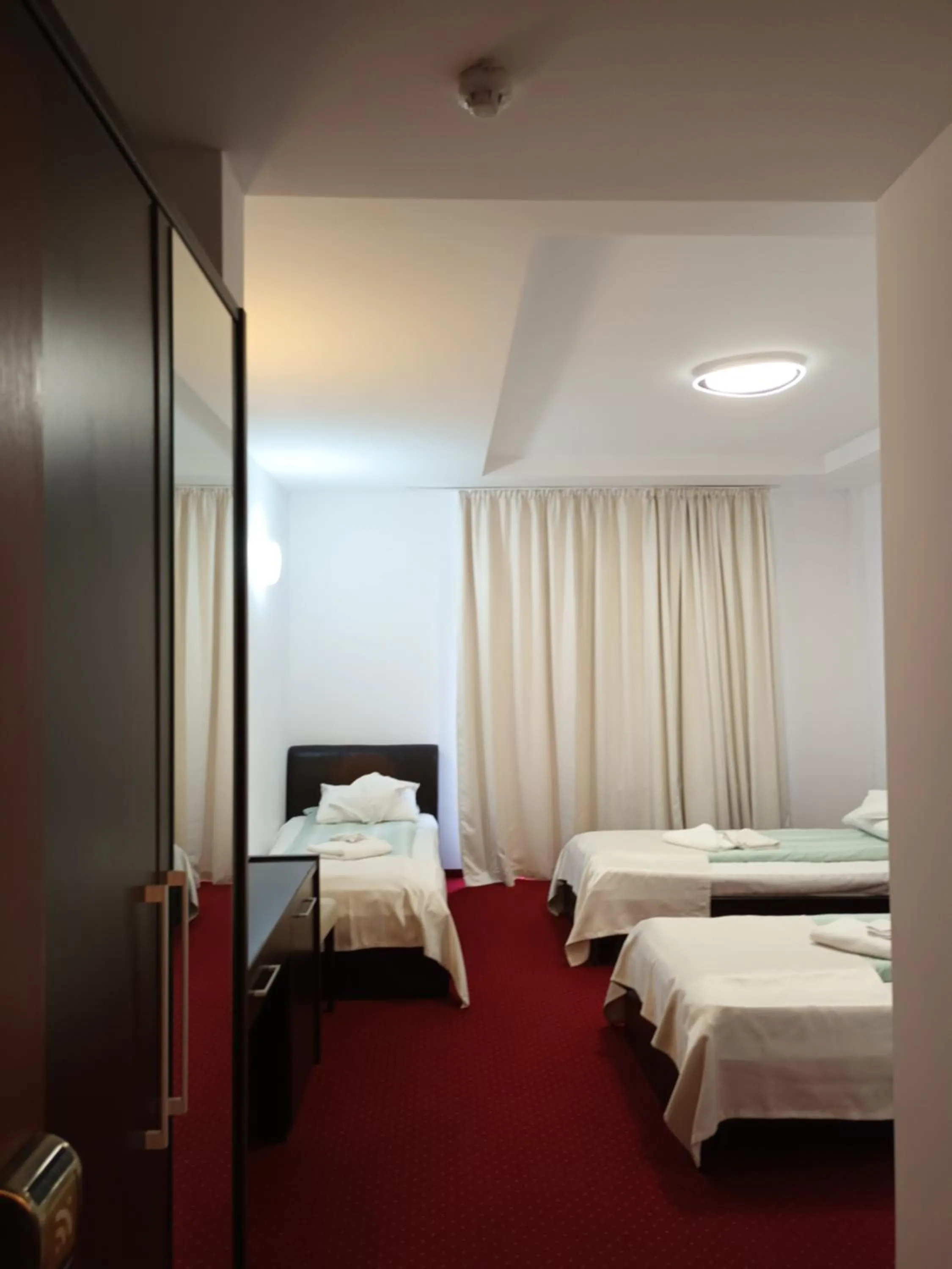 Bed in Hotel Transilvania Zalău