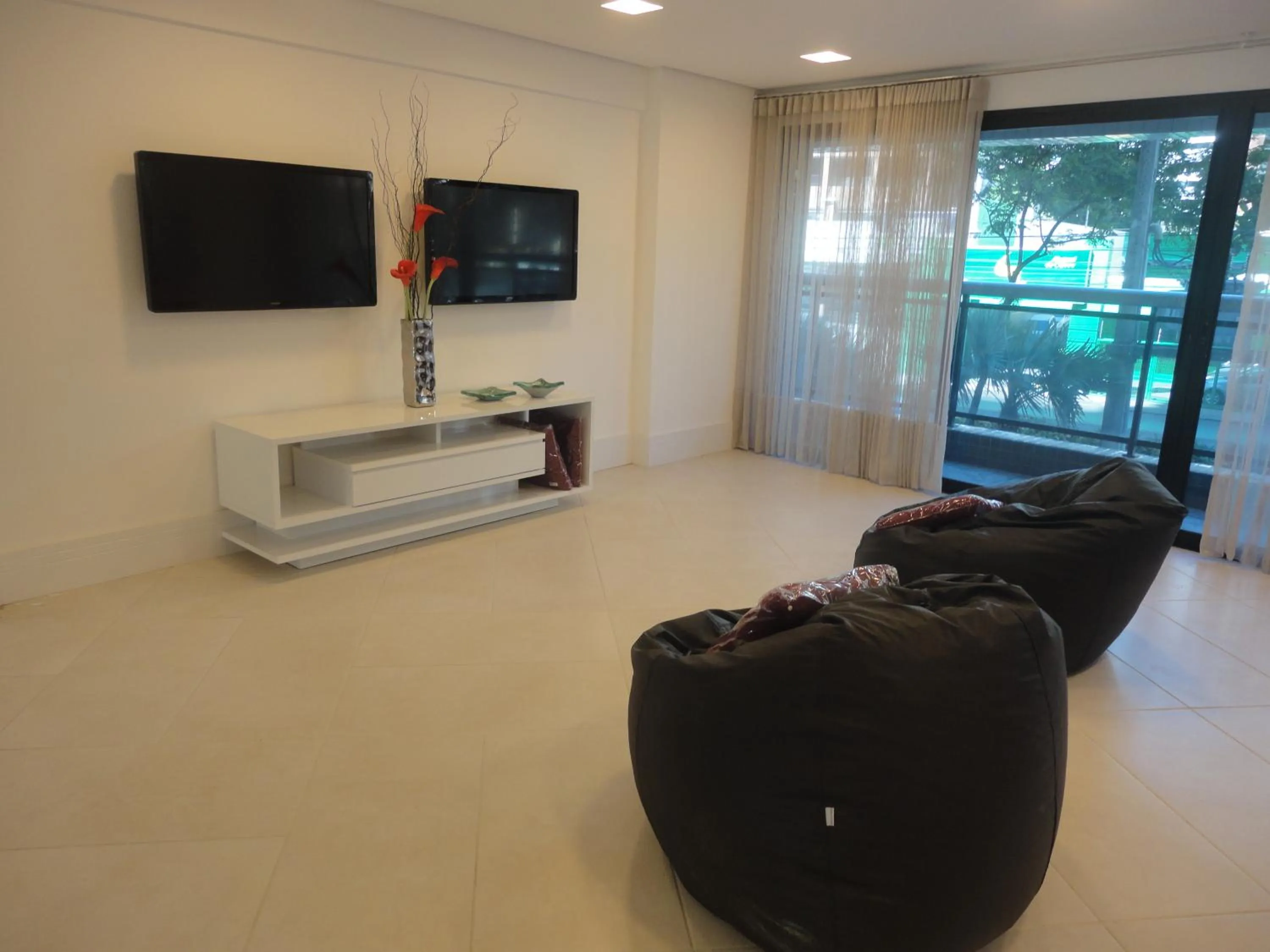 Communal lounge/ TV room in Fortaleza VIP Experience