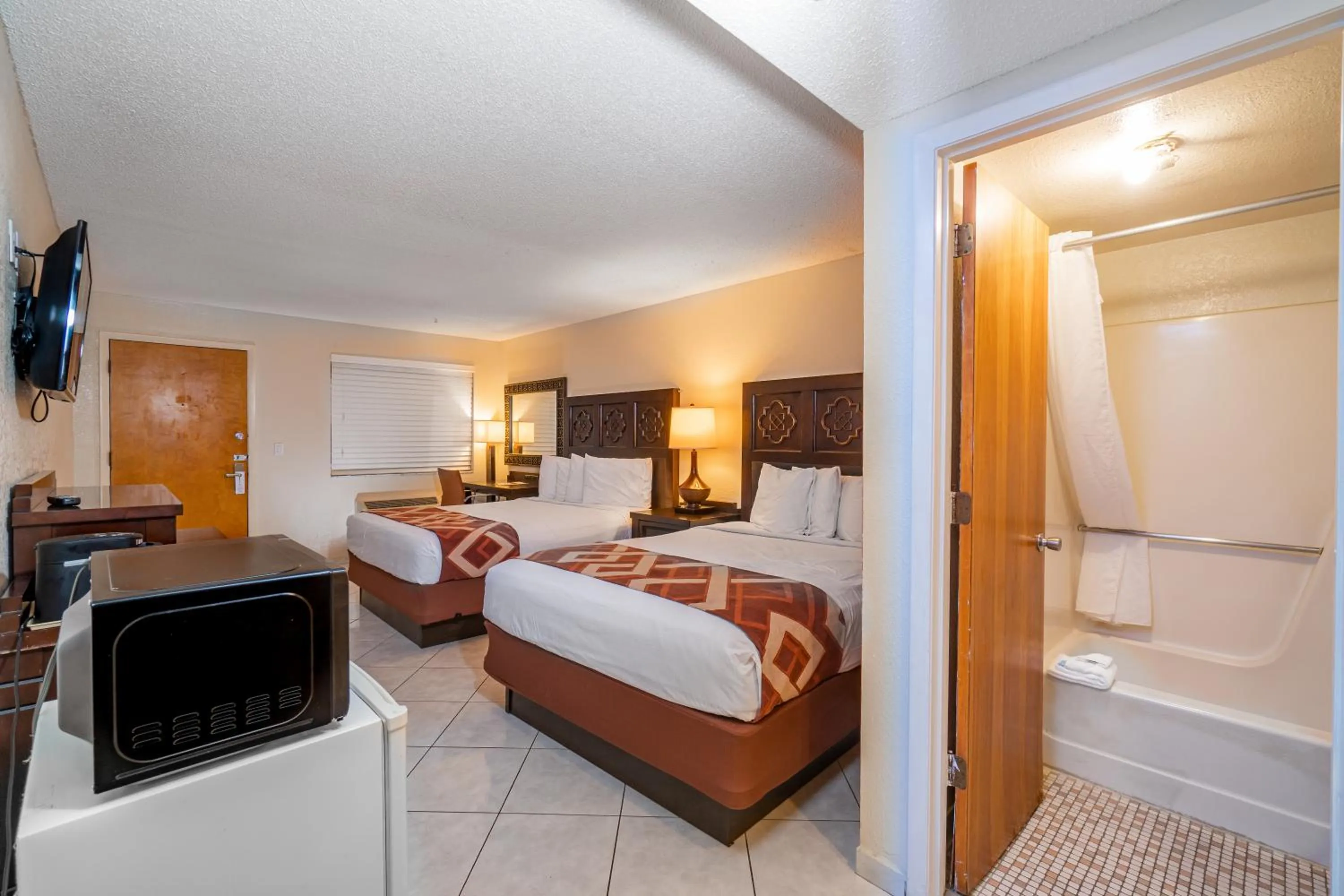 Photo of the whole room, Bed in Sevilla Inn Kissimmee- Near Disney