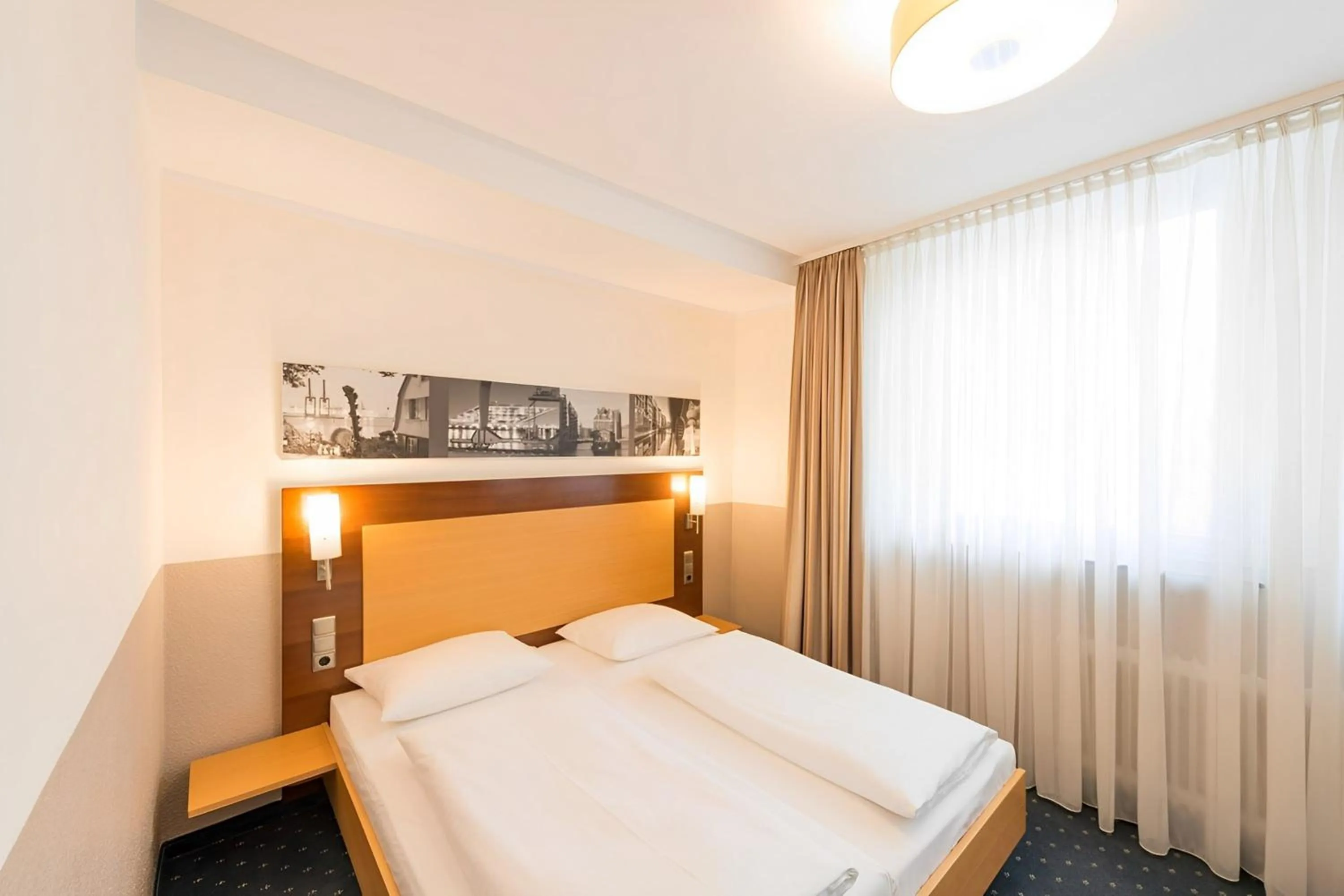 Bed in Heikotel - Stadtpark Residenz