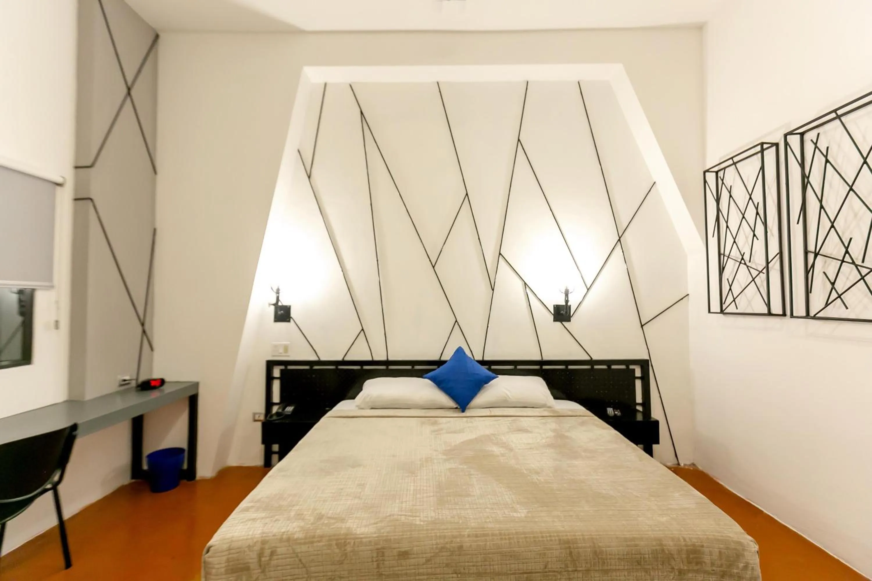 Bed in D' LA TORRE HOTEL