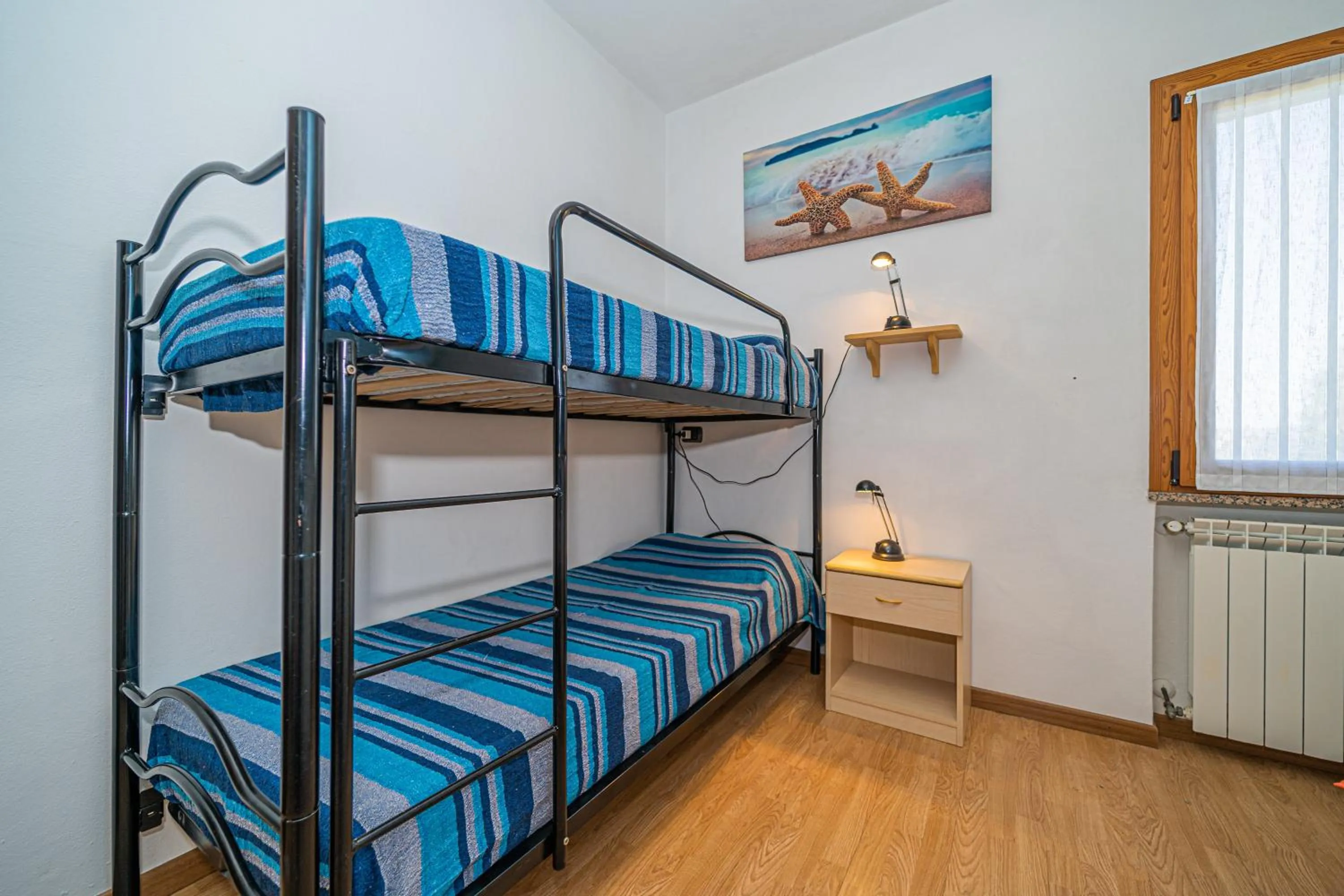 Bed in Master apartment in villa 6 to 8 persons with large private garden