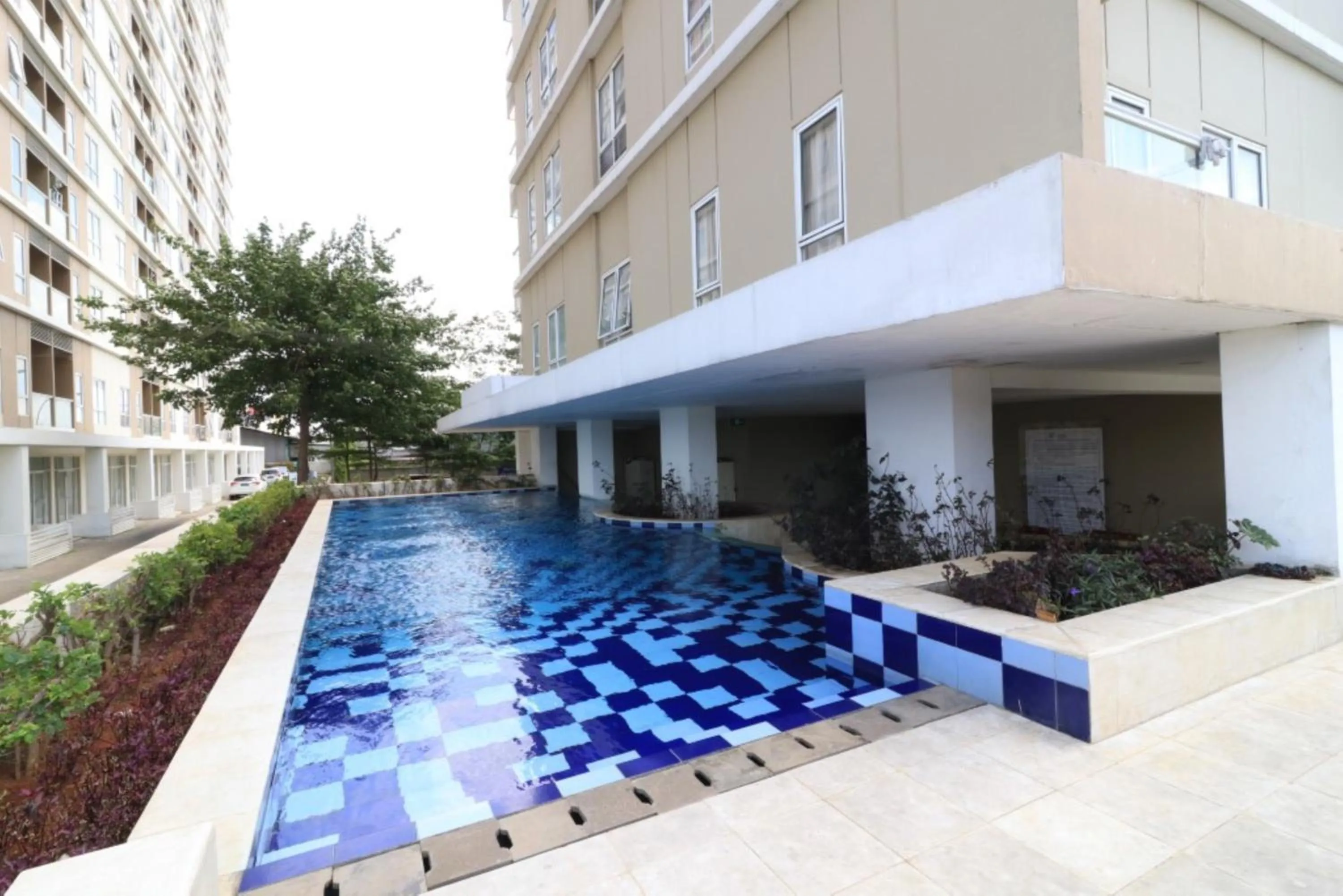 Property building in Paradise Mansion Apartment by Guardian Pro