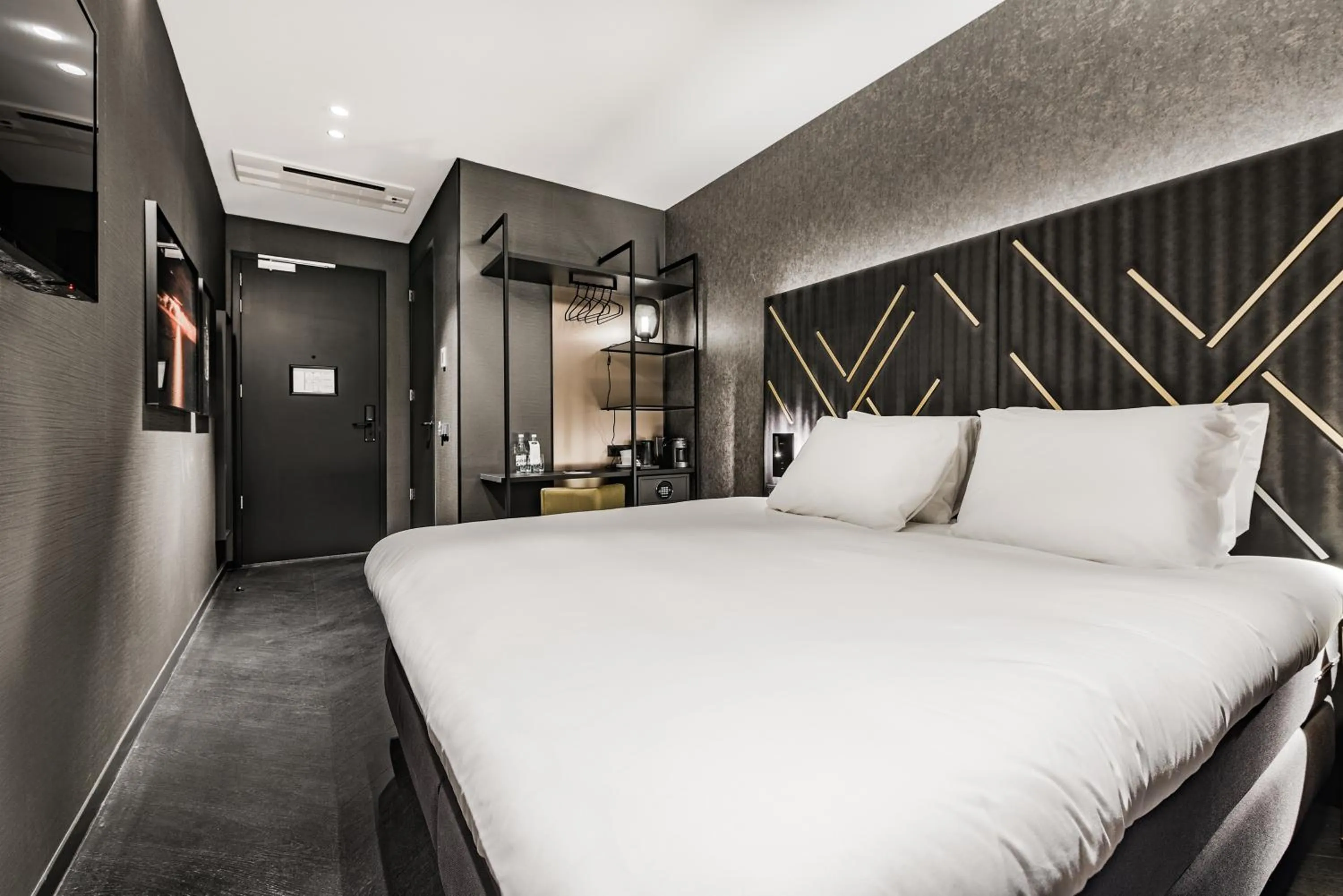 Bed in Le Petit Marin Boutique Hotel