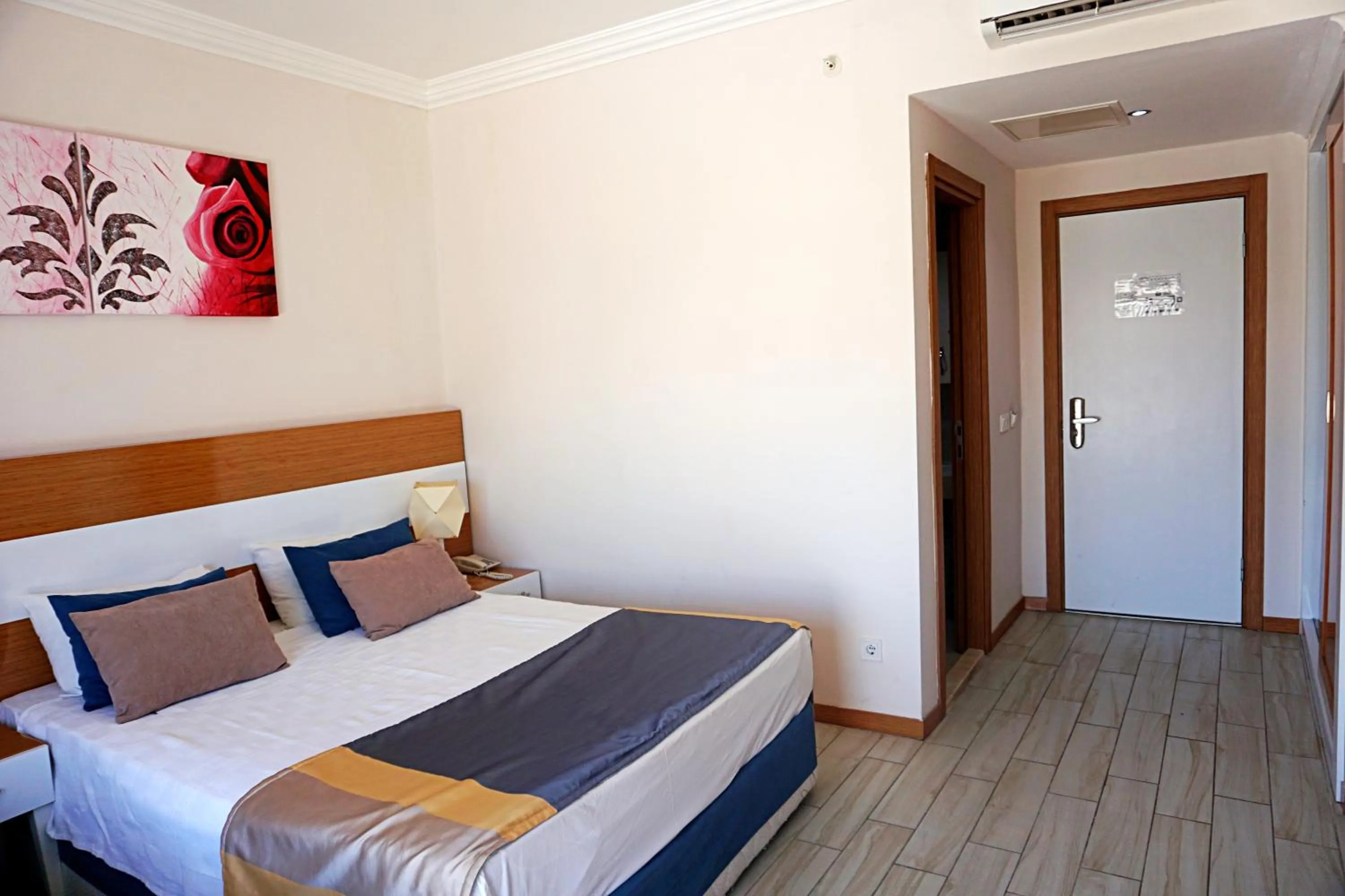 Bed in Side Legend Hotel