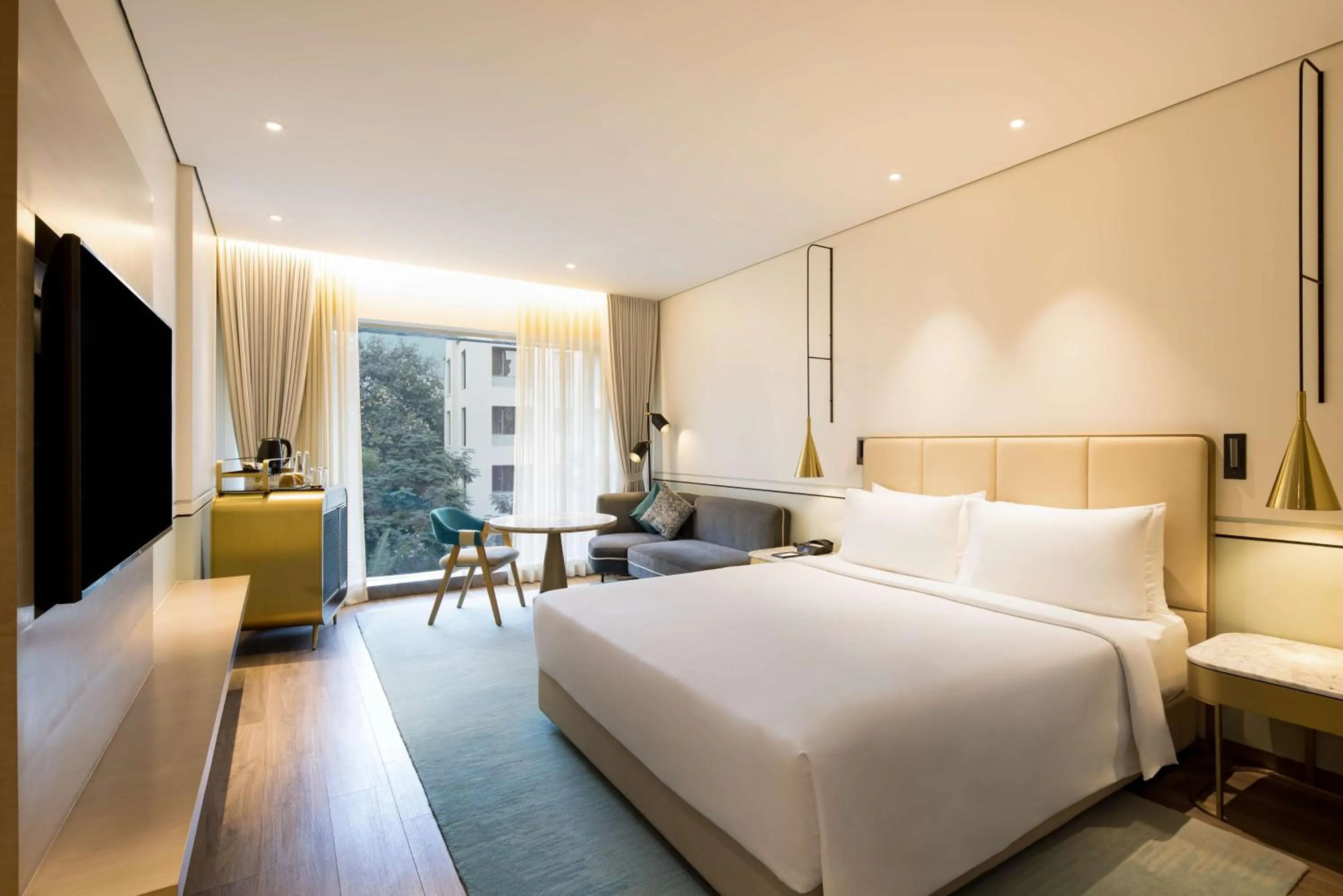 Photo of the whole room, Bed in Radisson Blu Mumbai International Airport