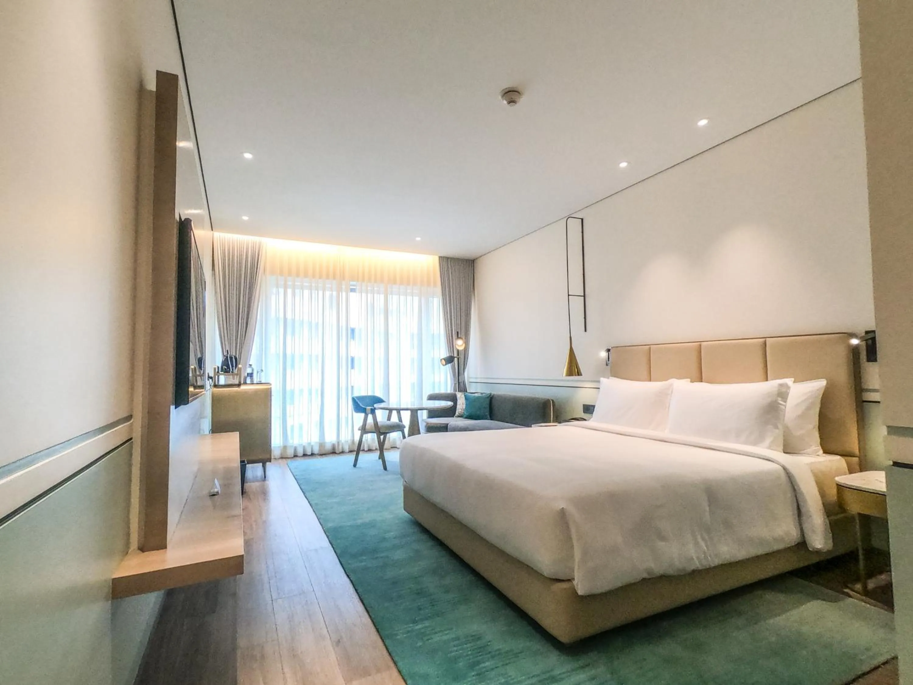 Photo of the whole room, Bed in Radisson Blu Mumbai International Airport