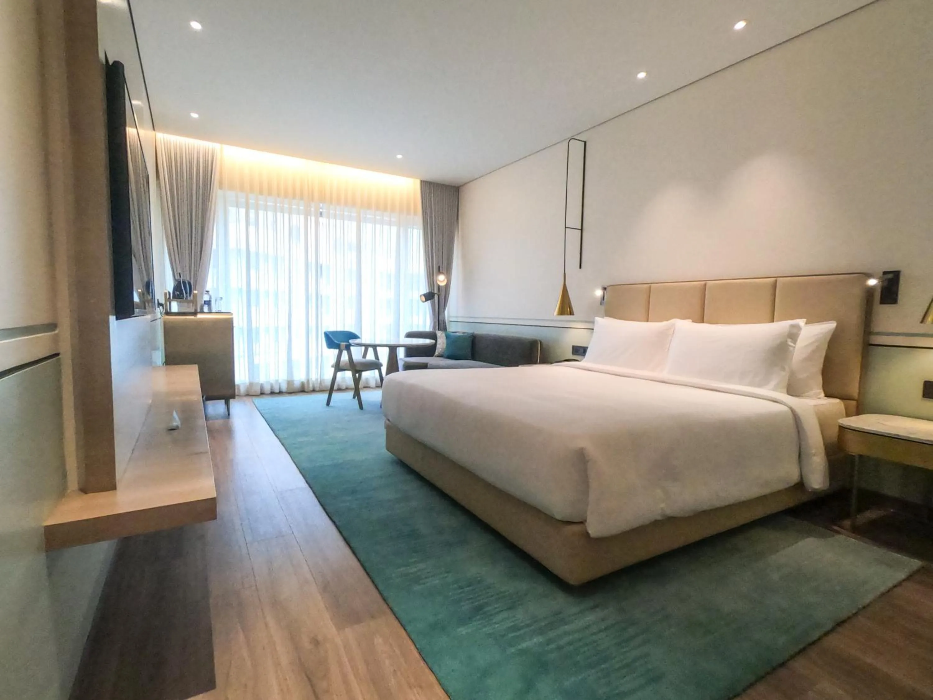 Photo of the whole room, Bed in Radisson Blu Mumbai International Airport