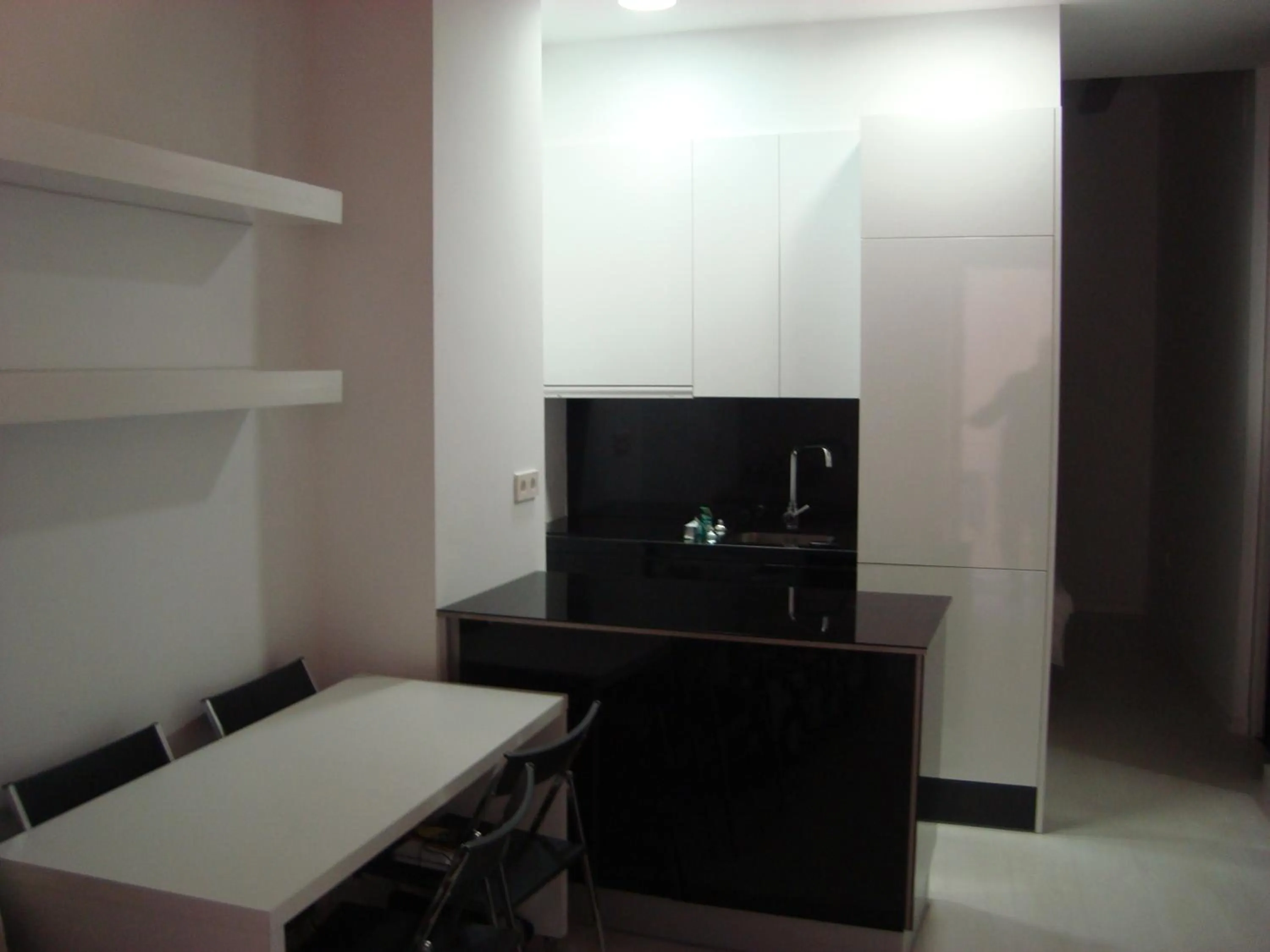 Kitchen or kitchenette in Mosen Sorell Apartments