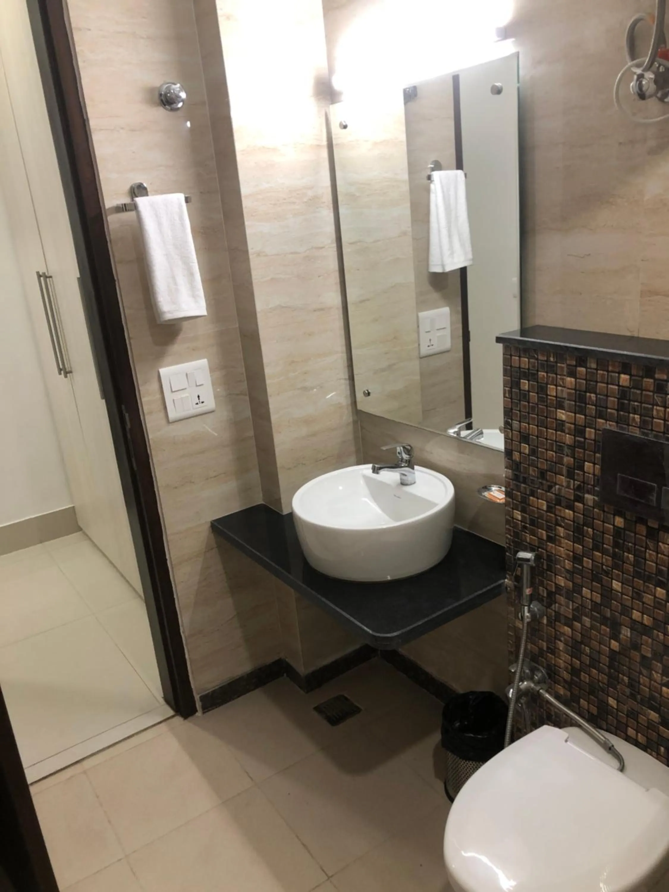 Bathroom in Lemon Green Residency - Hotel and Serviced Apartments