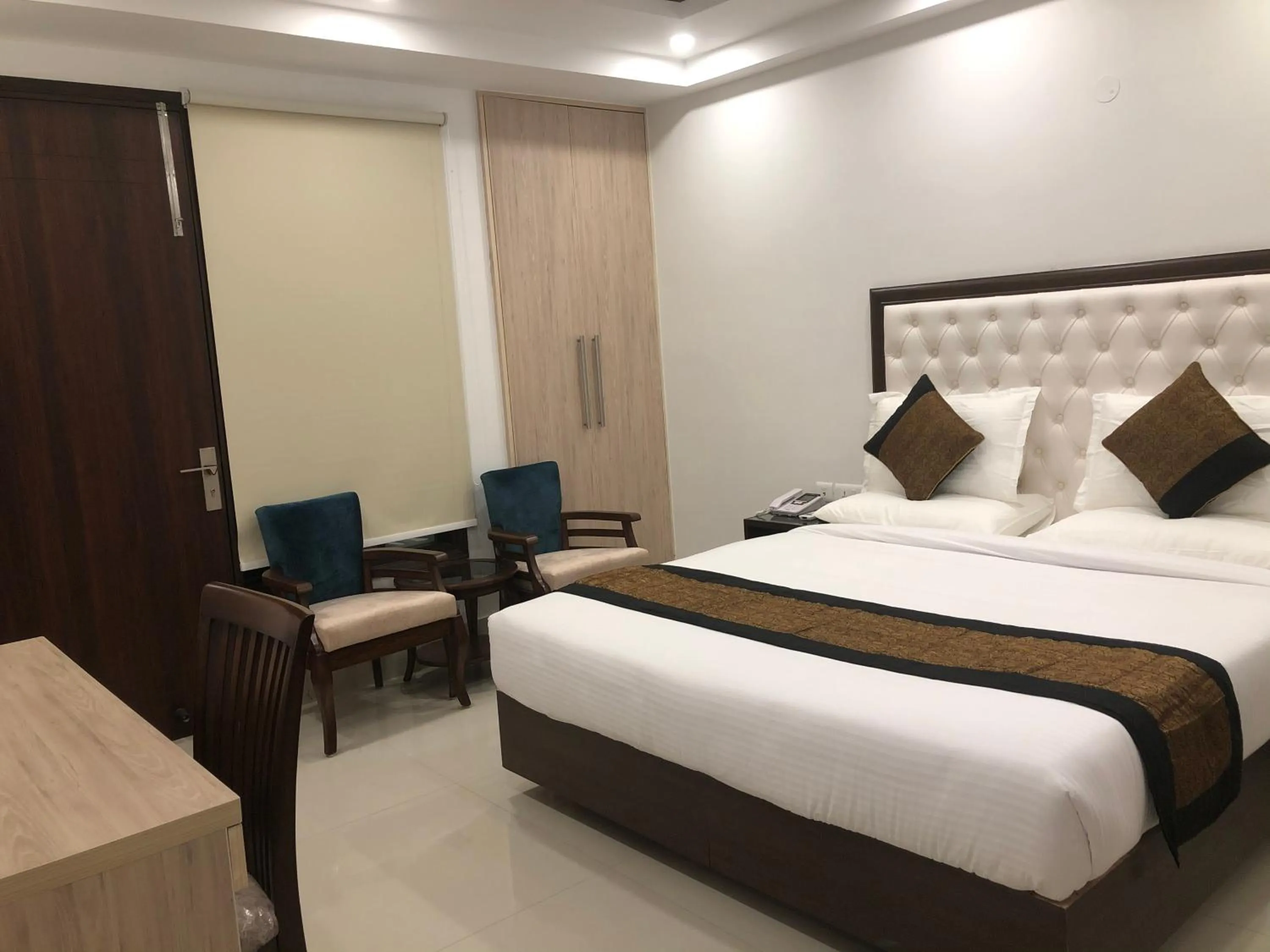 Photo of the whole room, Bed in Lemon Green Residency - Hotel and Serviced Apartments