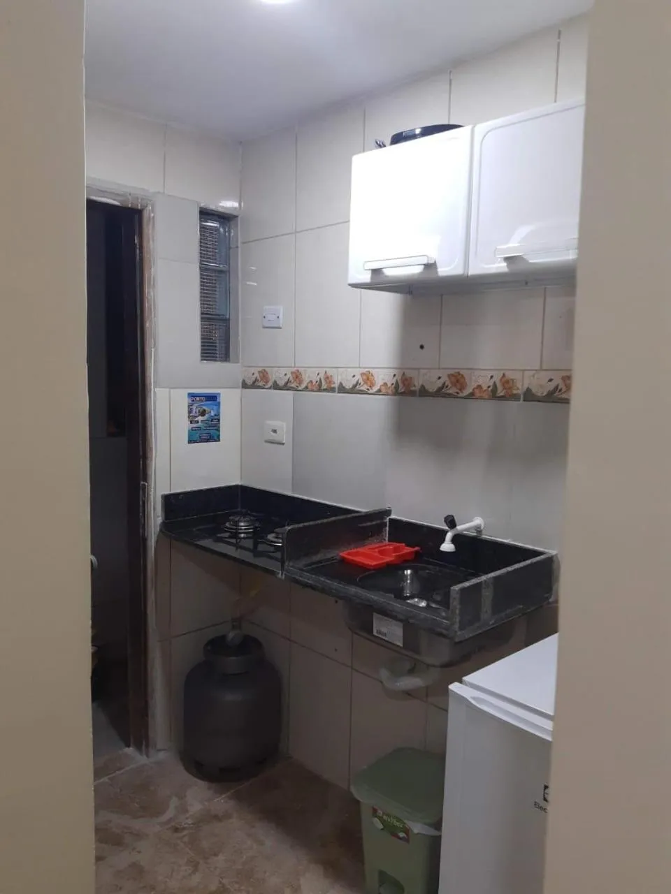 Kitchen or kitchenette in Suítes em Porto de Galinhas