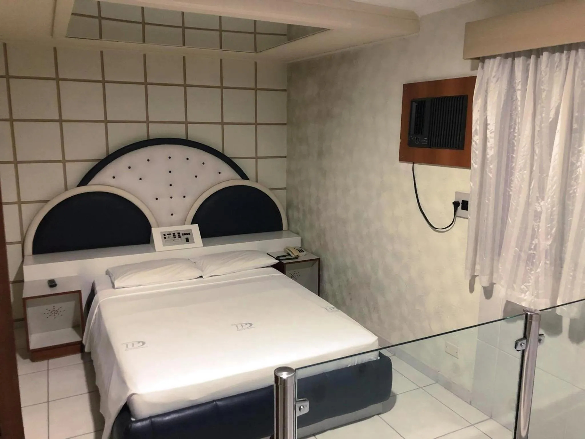 Bed in David Plaza Hotel