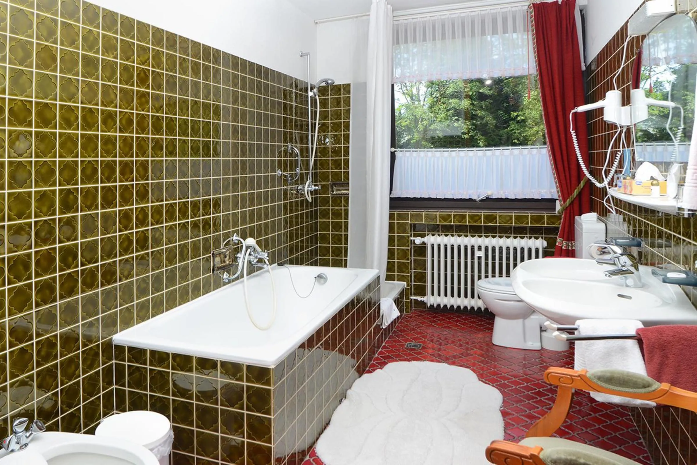 Bathroom in Wellness und Romantik Hotel Helmboldt