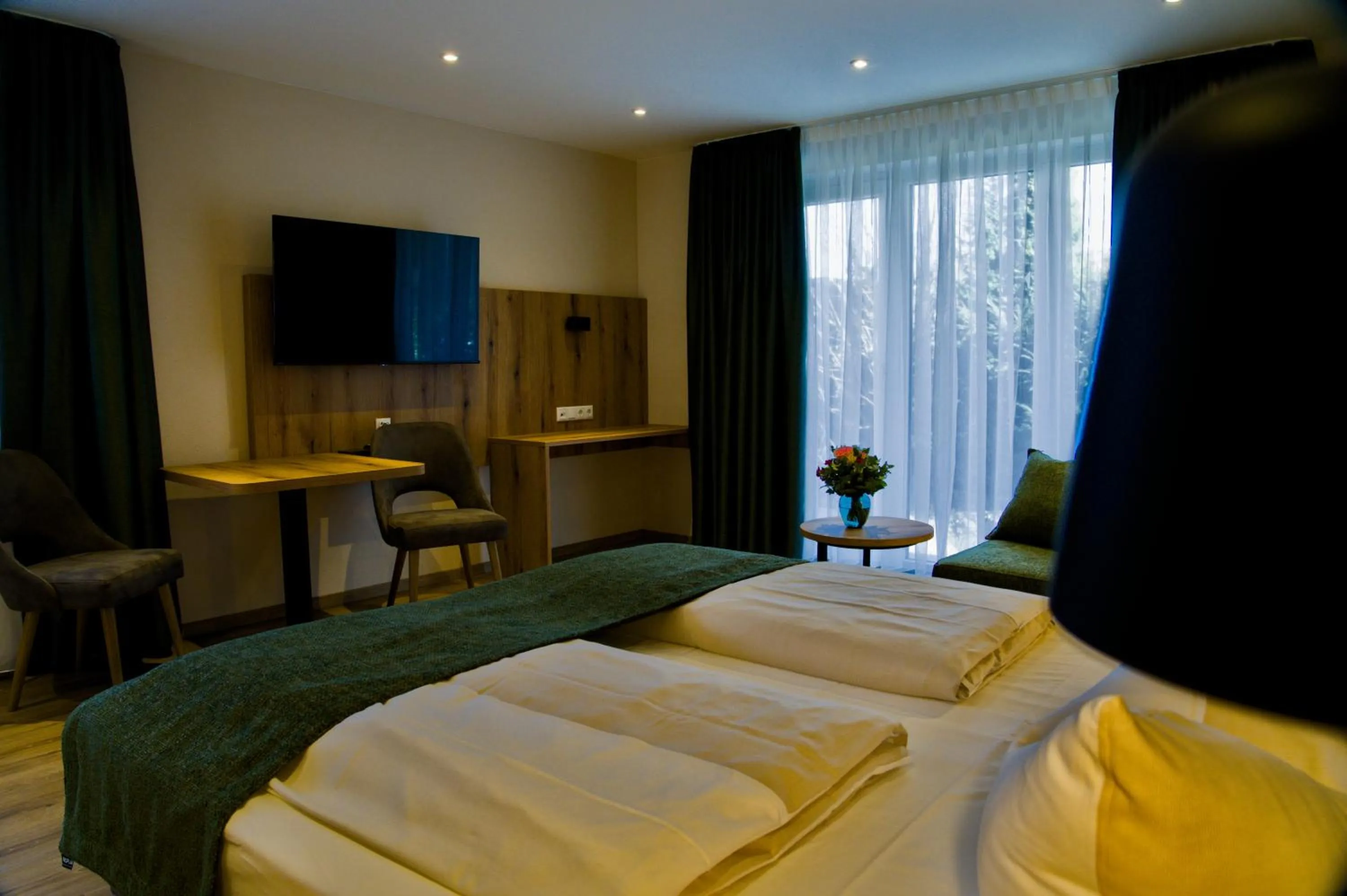 Bed in Hotel Happinger Hof