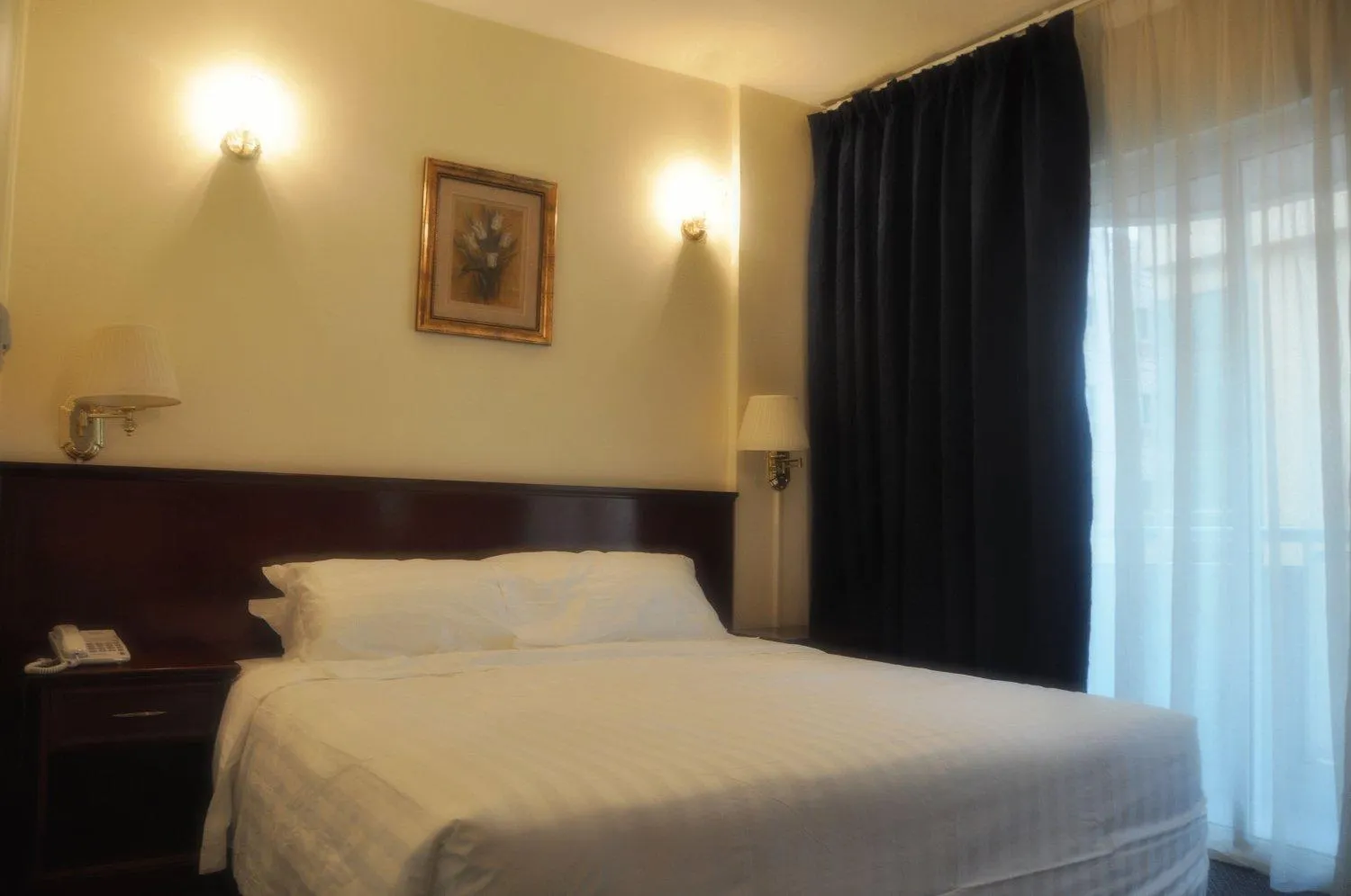 Bed in Royal Plaza Hotel Apartments