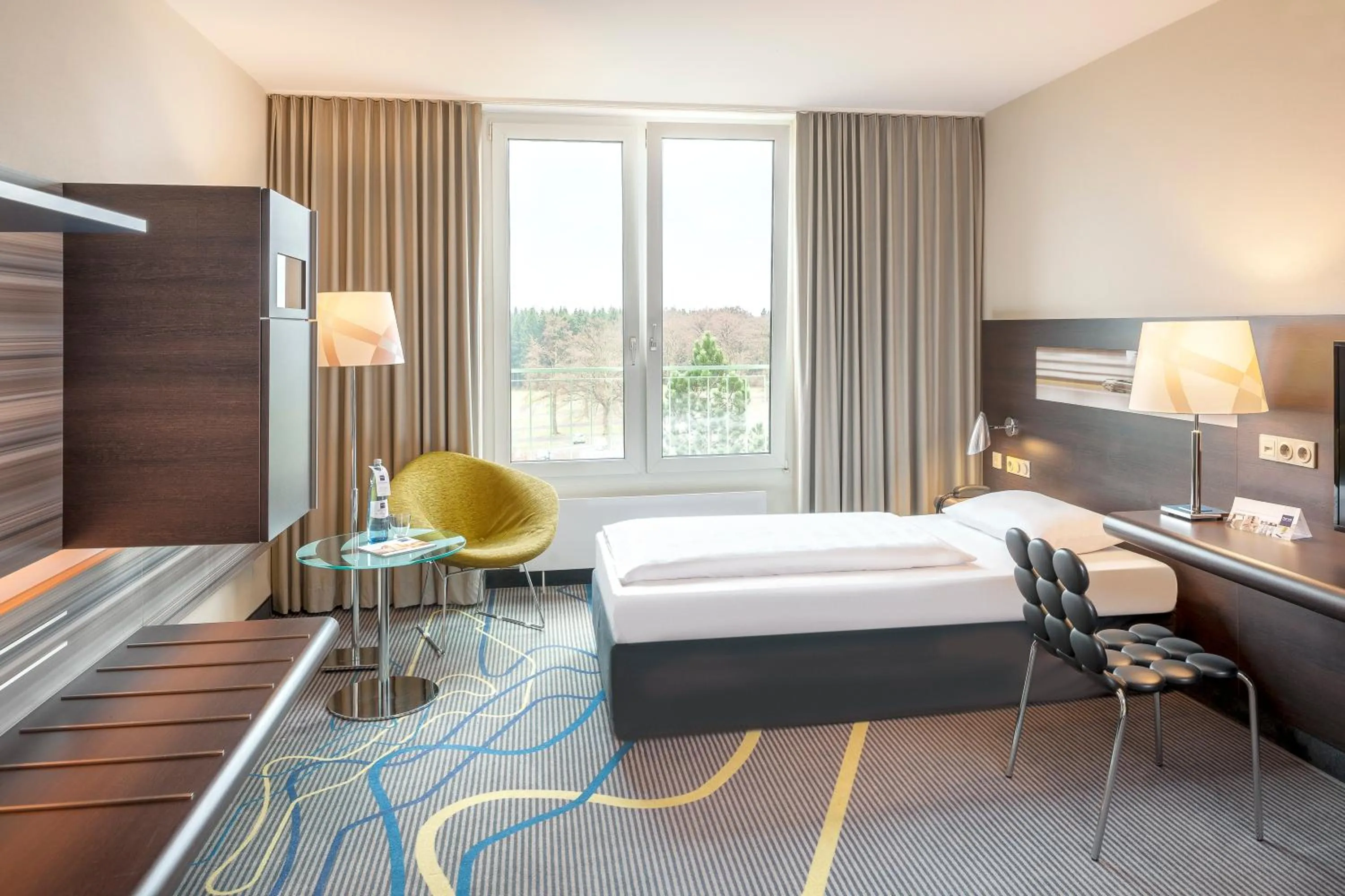 Photo of the whole room, Bed in Dorint Am Nürburgring Hocheifel