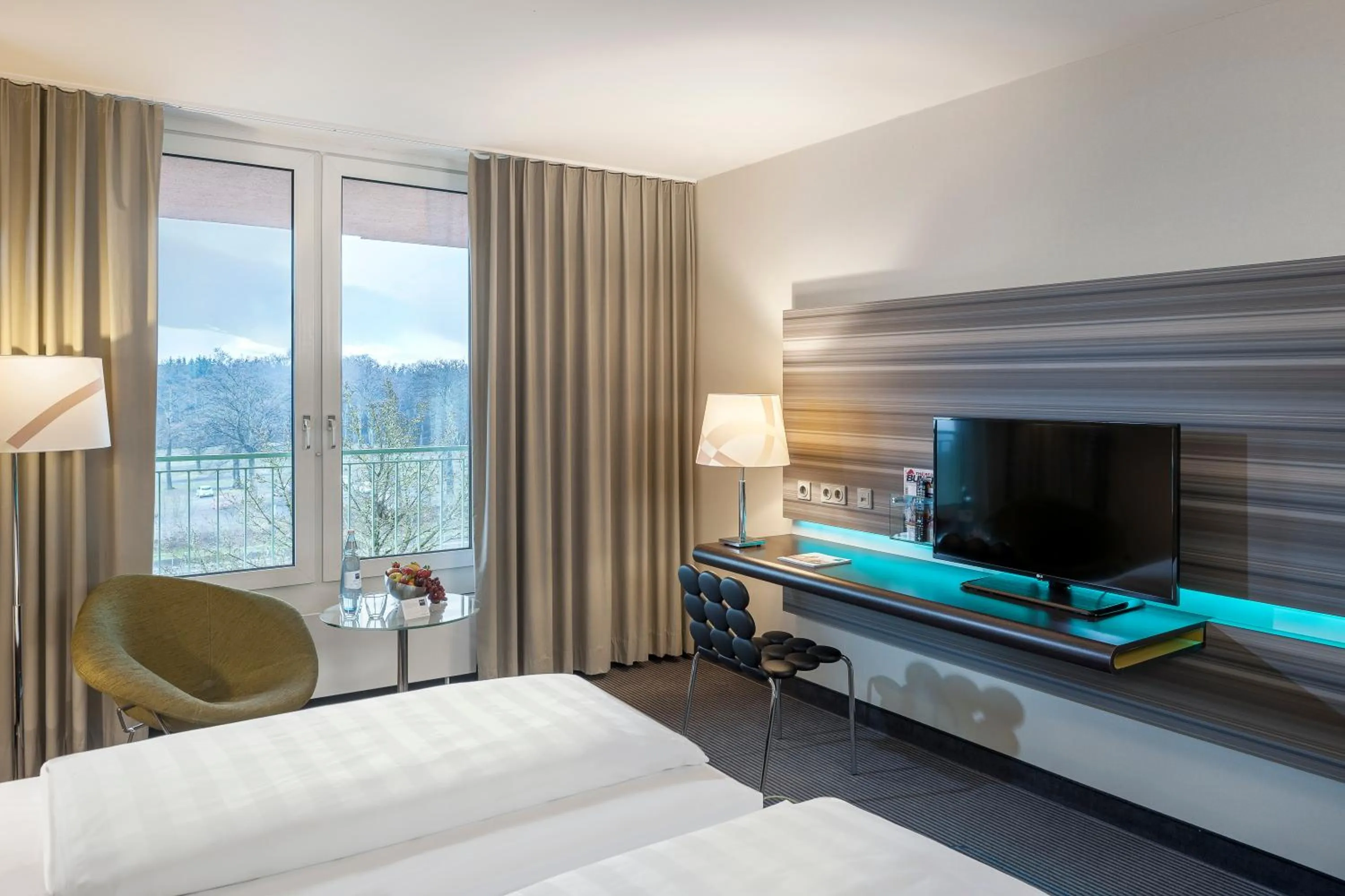 Photo of the whole room, Bed in Dorint Am Nürburgring Hocheifel