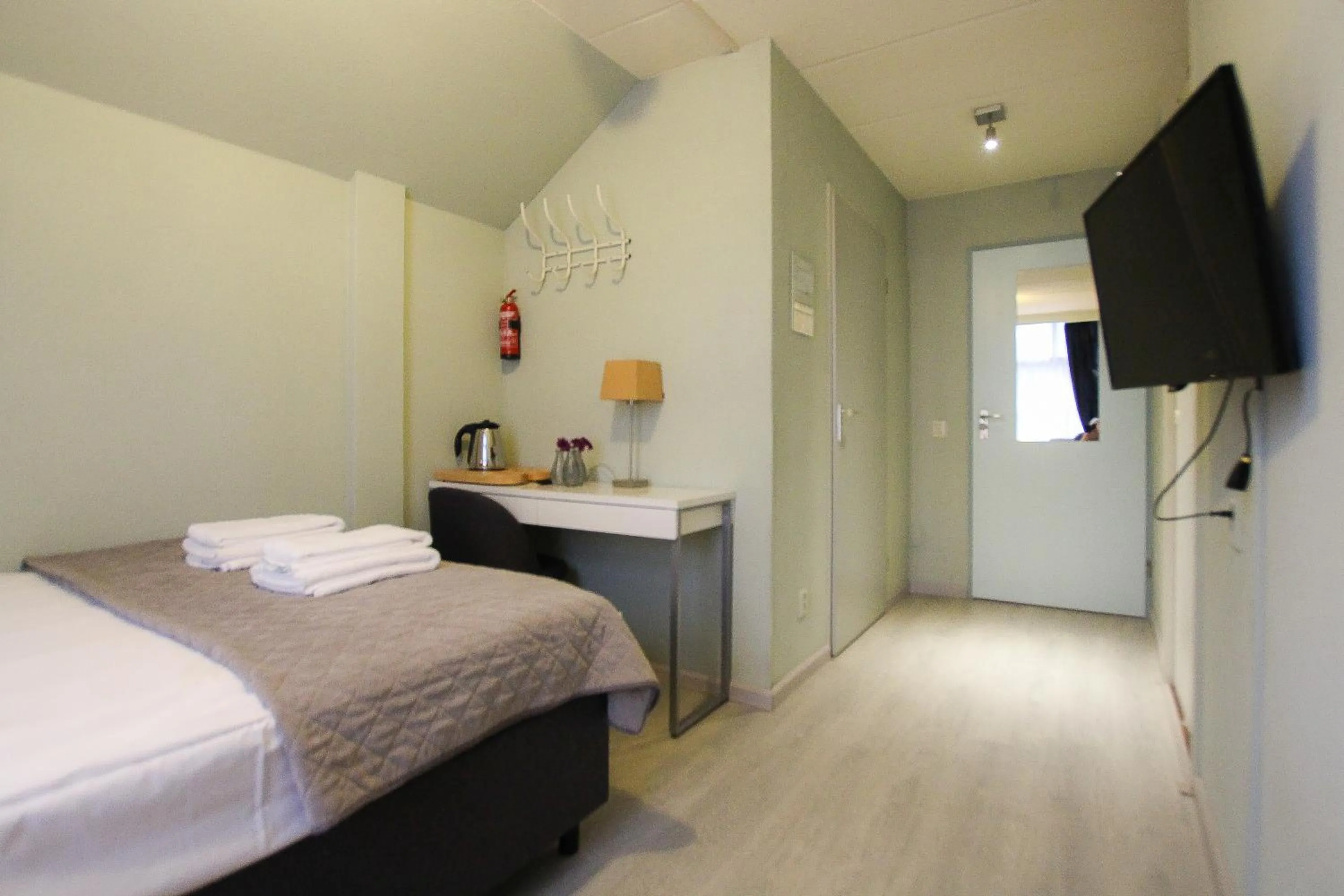 Bed in Hotel Joli Bergen