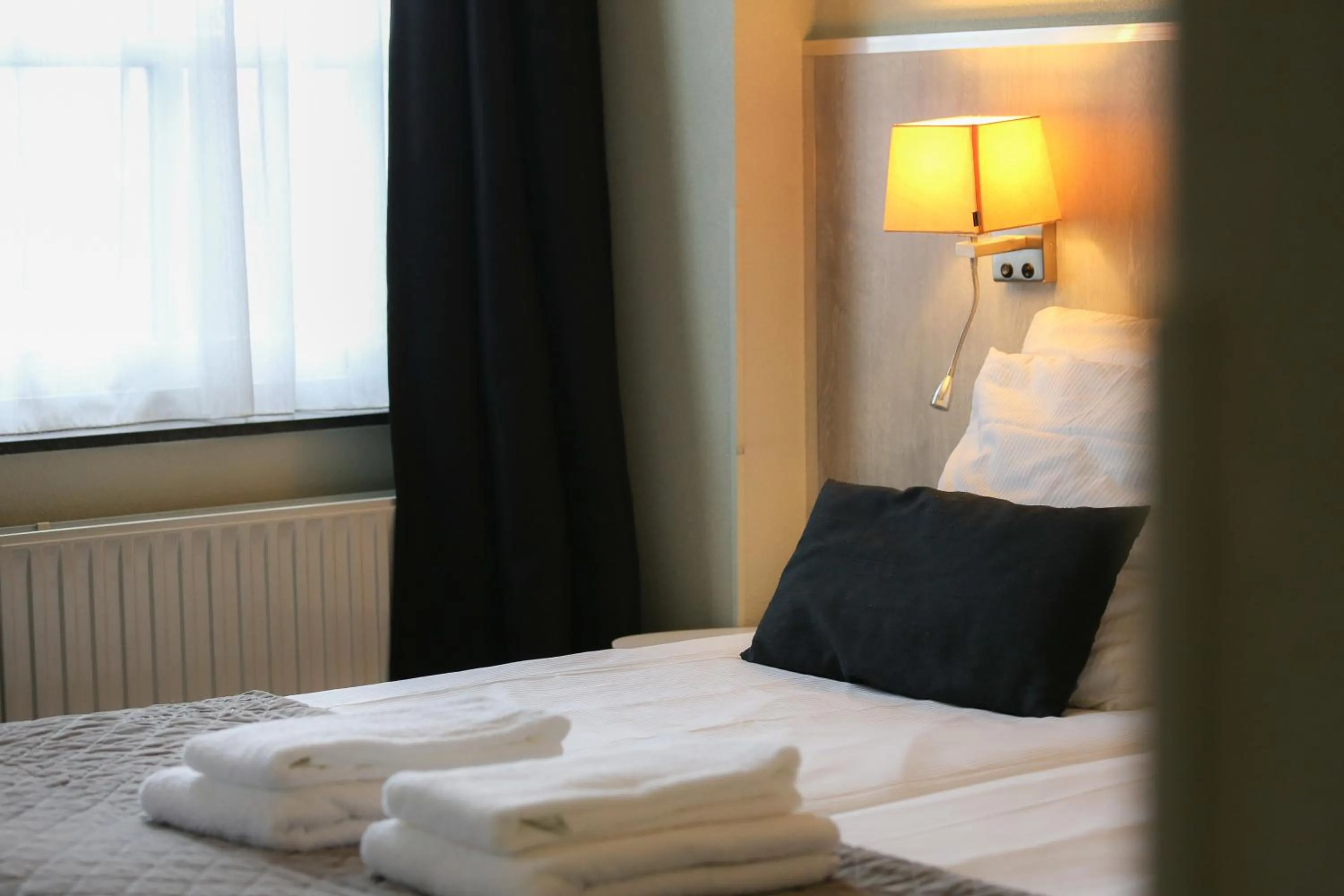 Bed in Hotel Joli Bergen