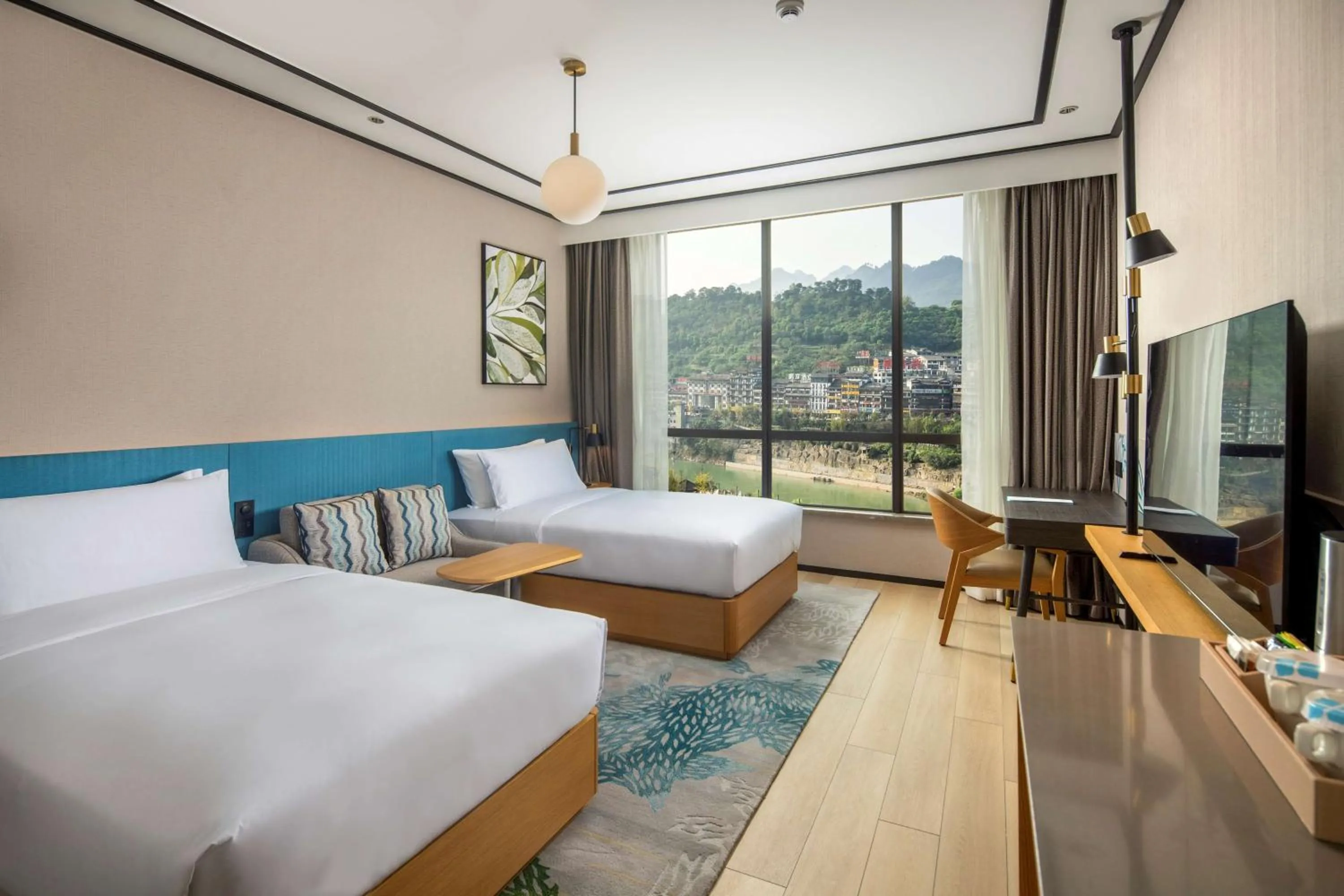 Living room, Bed in Hilton Garden Inn Guizhou Maotai Town