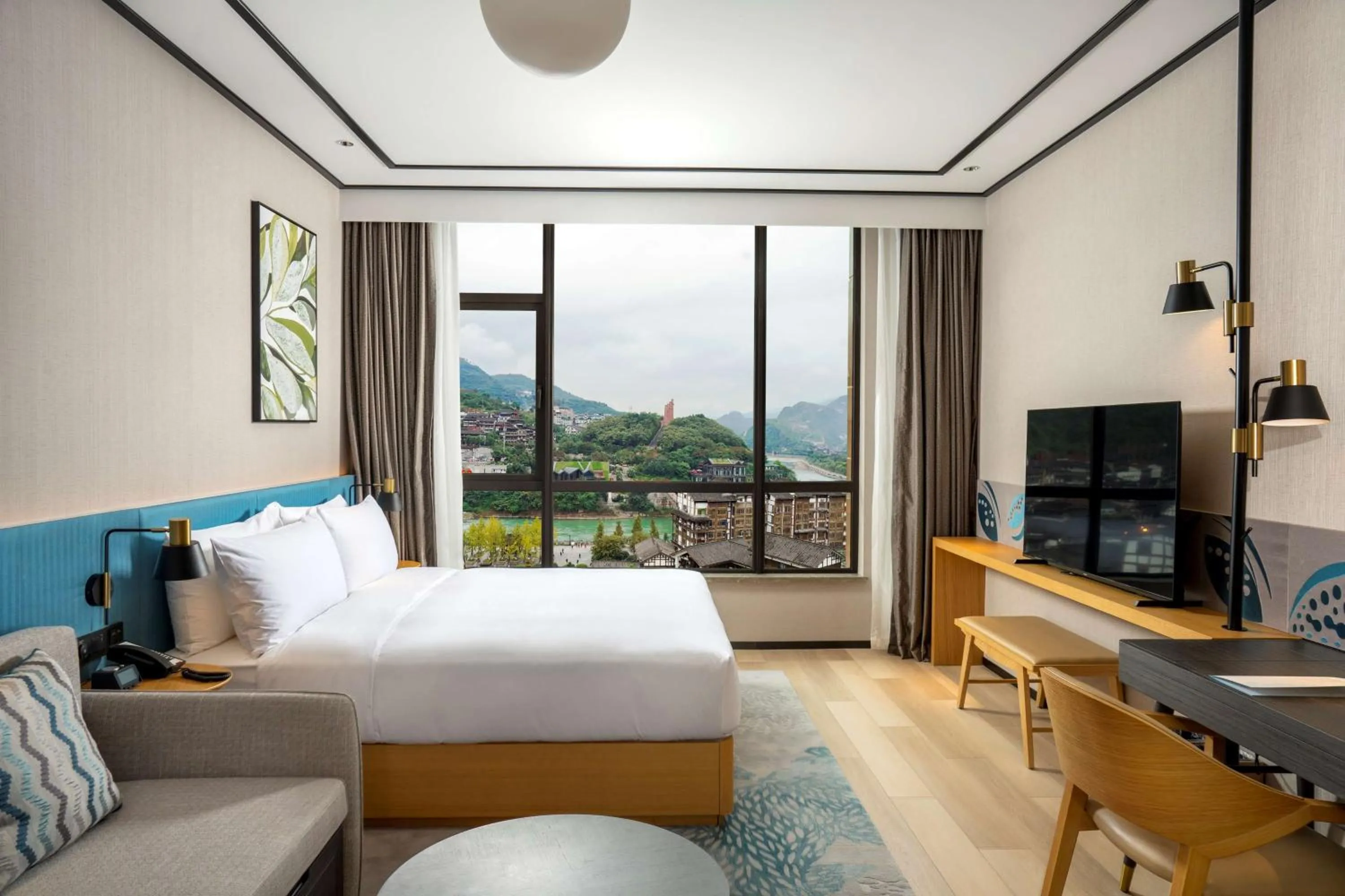 Living room, Bed in Hilton Garden Inn Guizhou Maotai Town