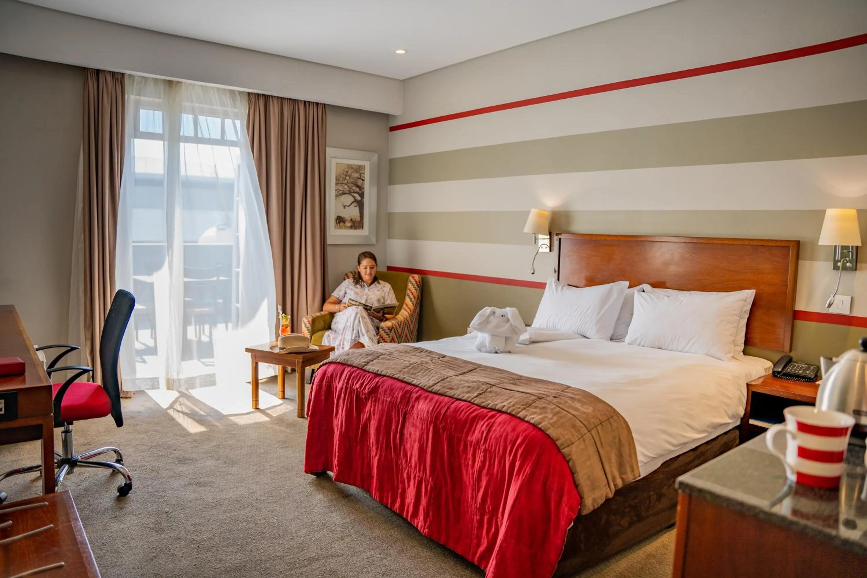 Photo of the whole room, Bed in Indaba Lodge Gaborone