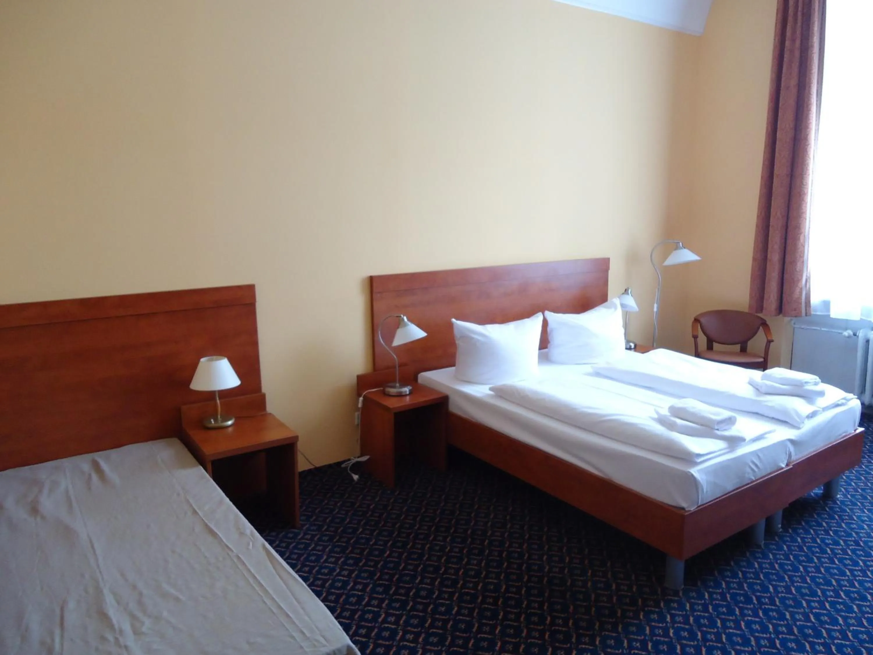Photo of the whole room, Bed in City Hotel am Kurfürstendamm