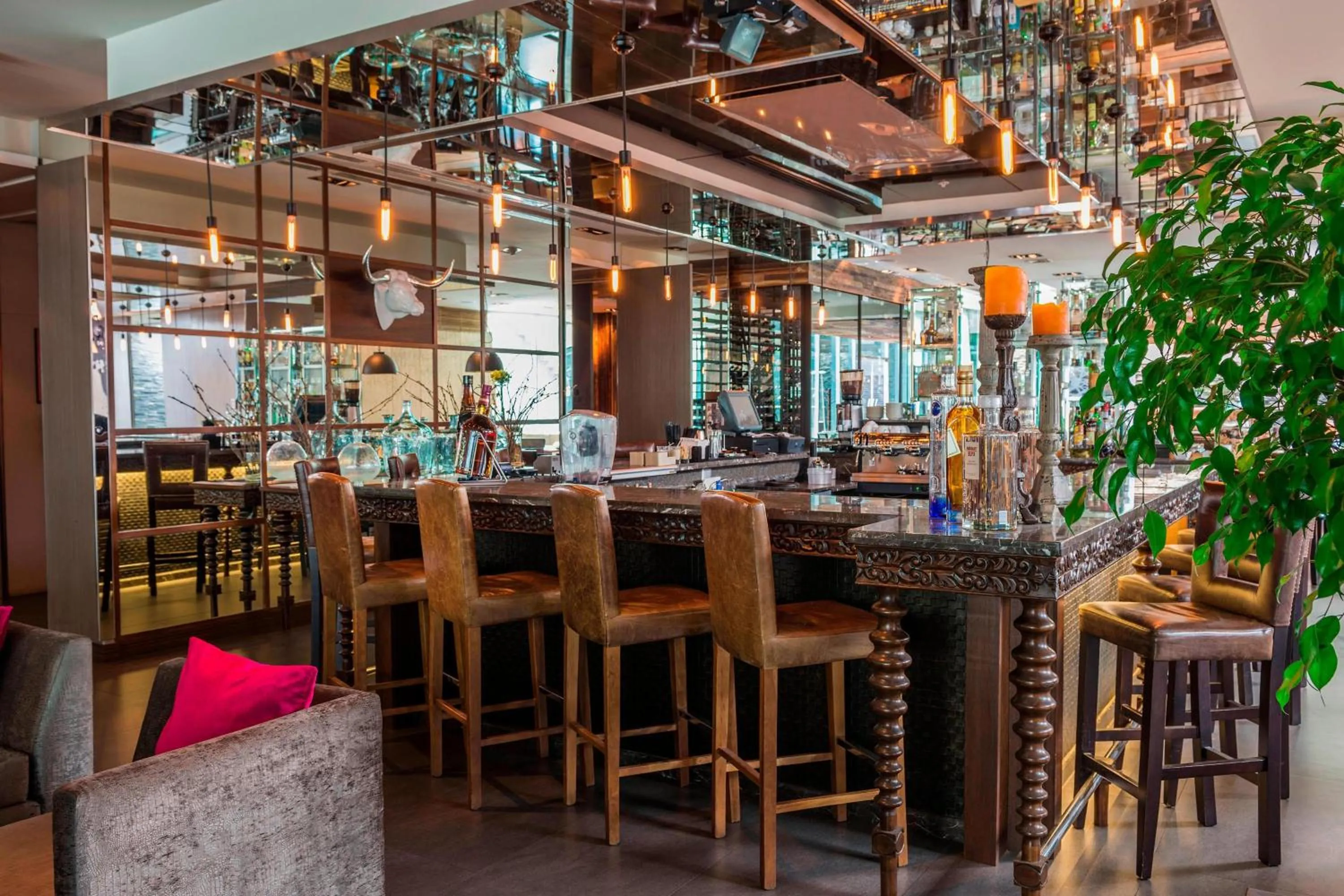 Lounge or bar in Renaissance Santiago by Marriott