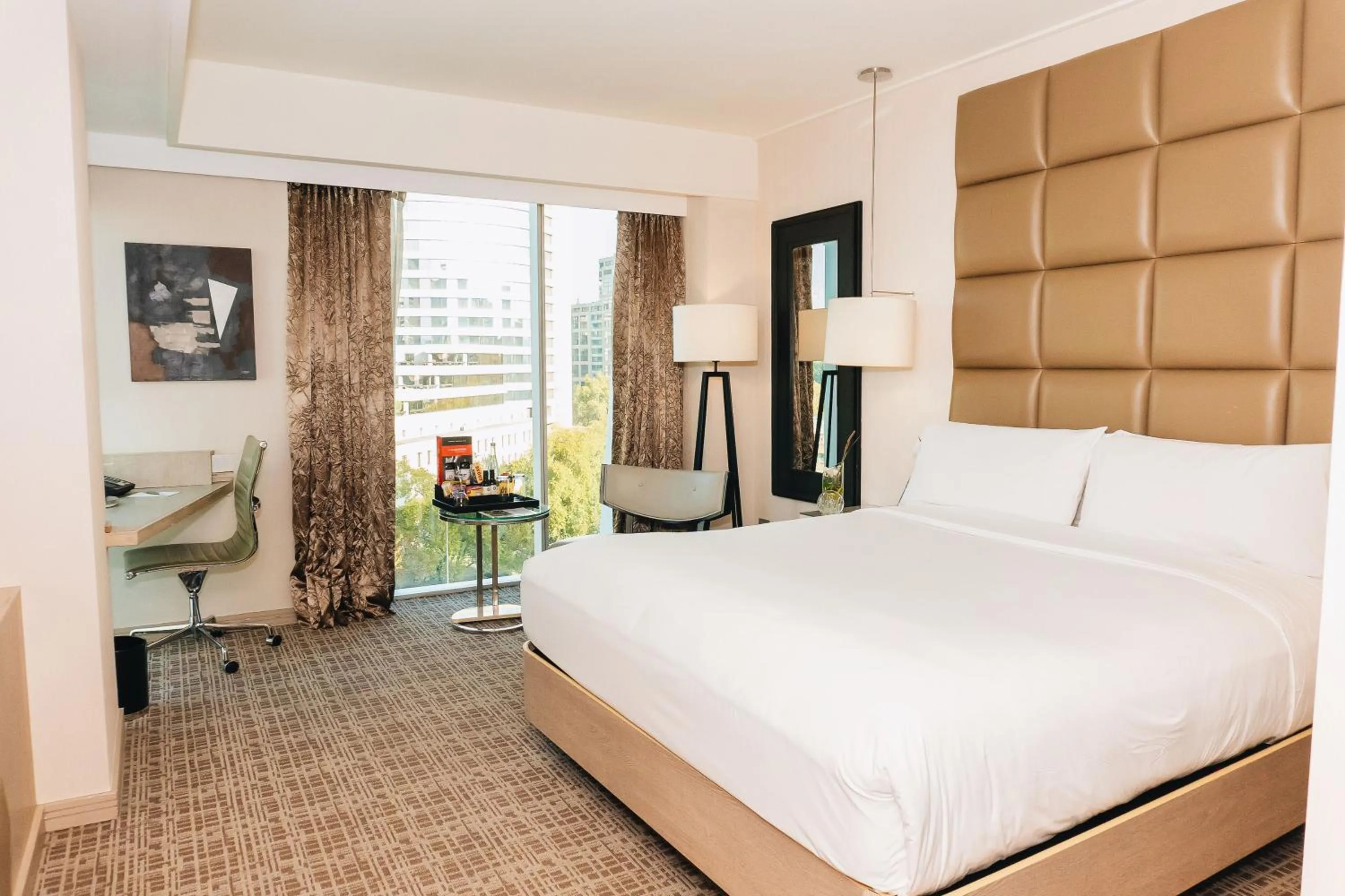 Bed in Renaissance Santiago by Marriott