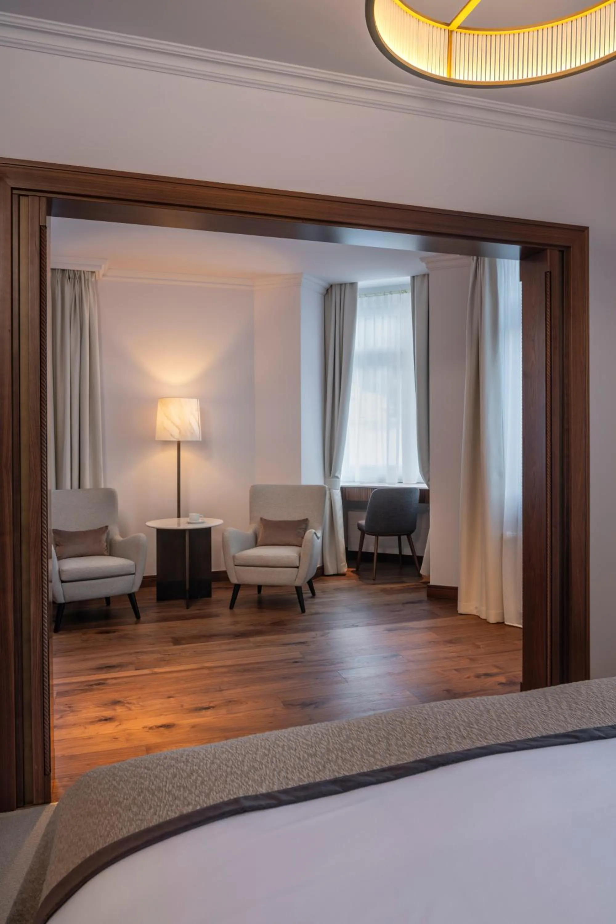 Living room, Bed in Grand Hotel des Bains Kempinski