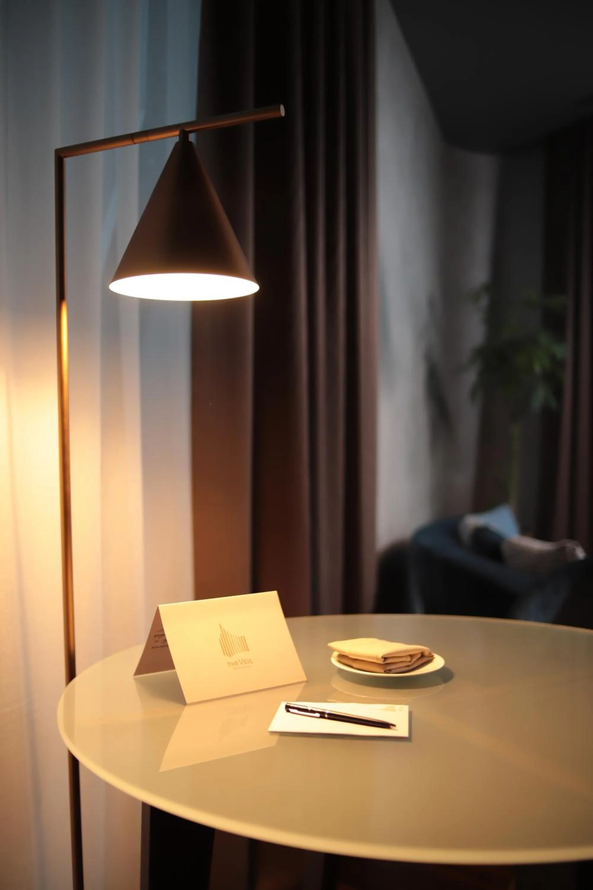 Communal lounge/ TV room in The Veil Hotel