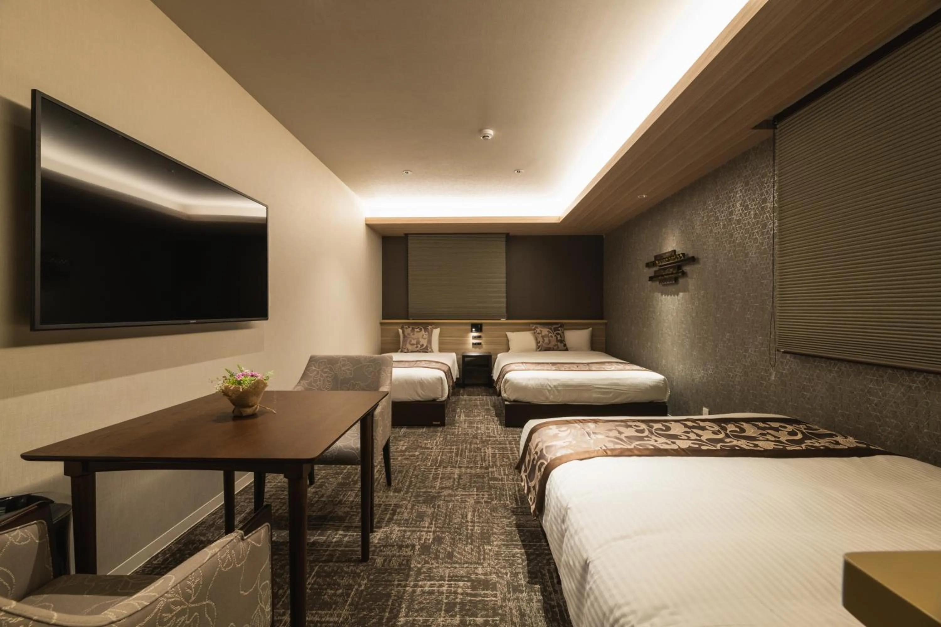 Bed in GRAND BASE Kagoshima Tenmonkan