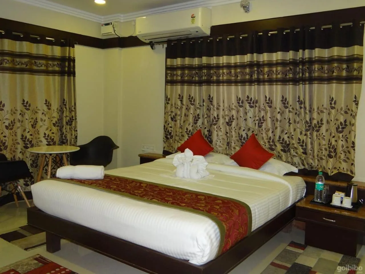 Bed in Hotel Rose Mansion Manyata Tech Park